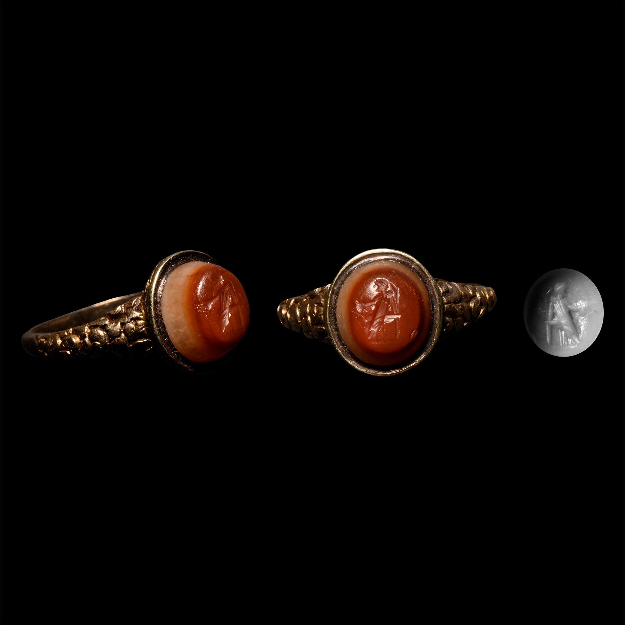 Roman Gemstone of a Seated Figure Set into a Gold Georgian Ring