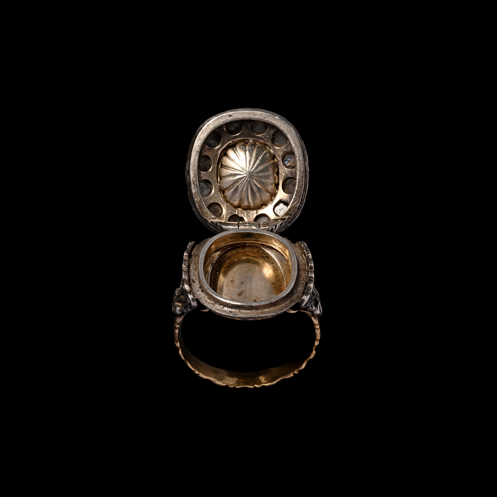 Diamond Locket Ring Set with Emerald Intaglio of Eros, the Greek God of Love, Playing Aulos