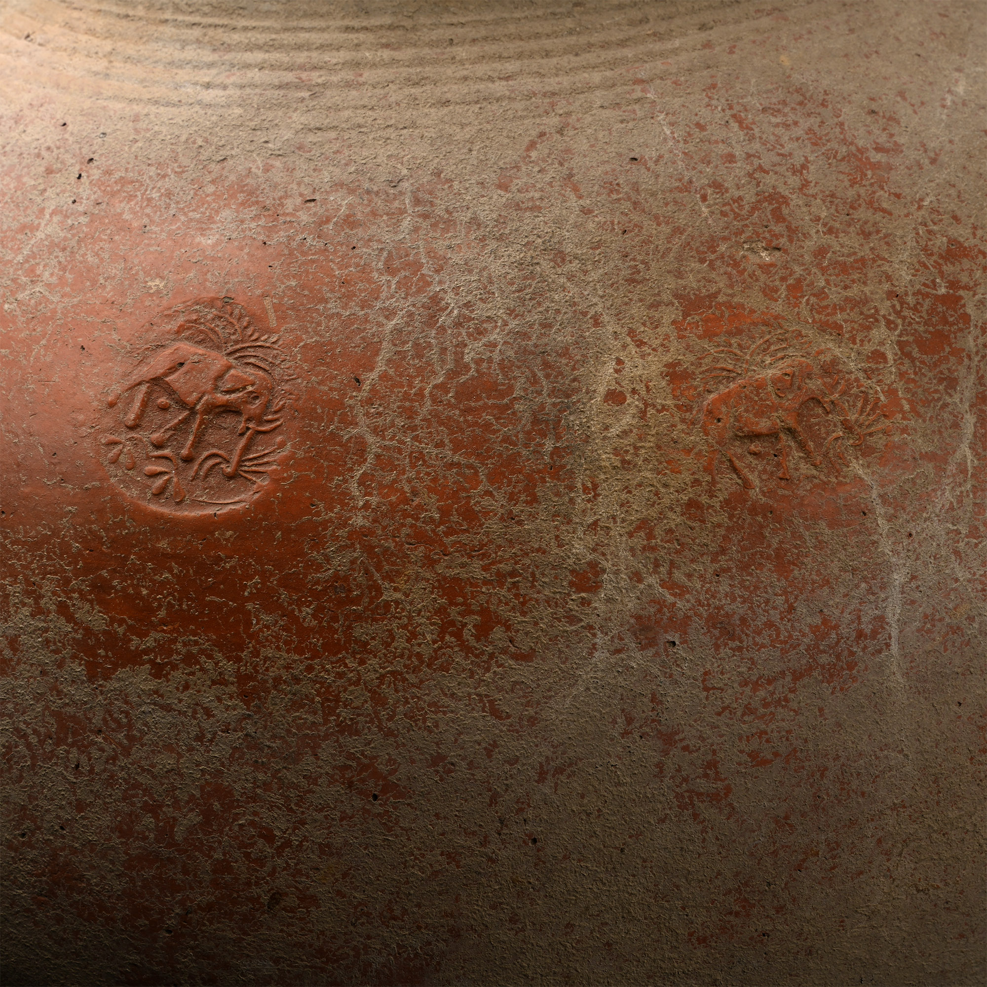 Large Indian Earthenware Vessel with Elephant Impressions