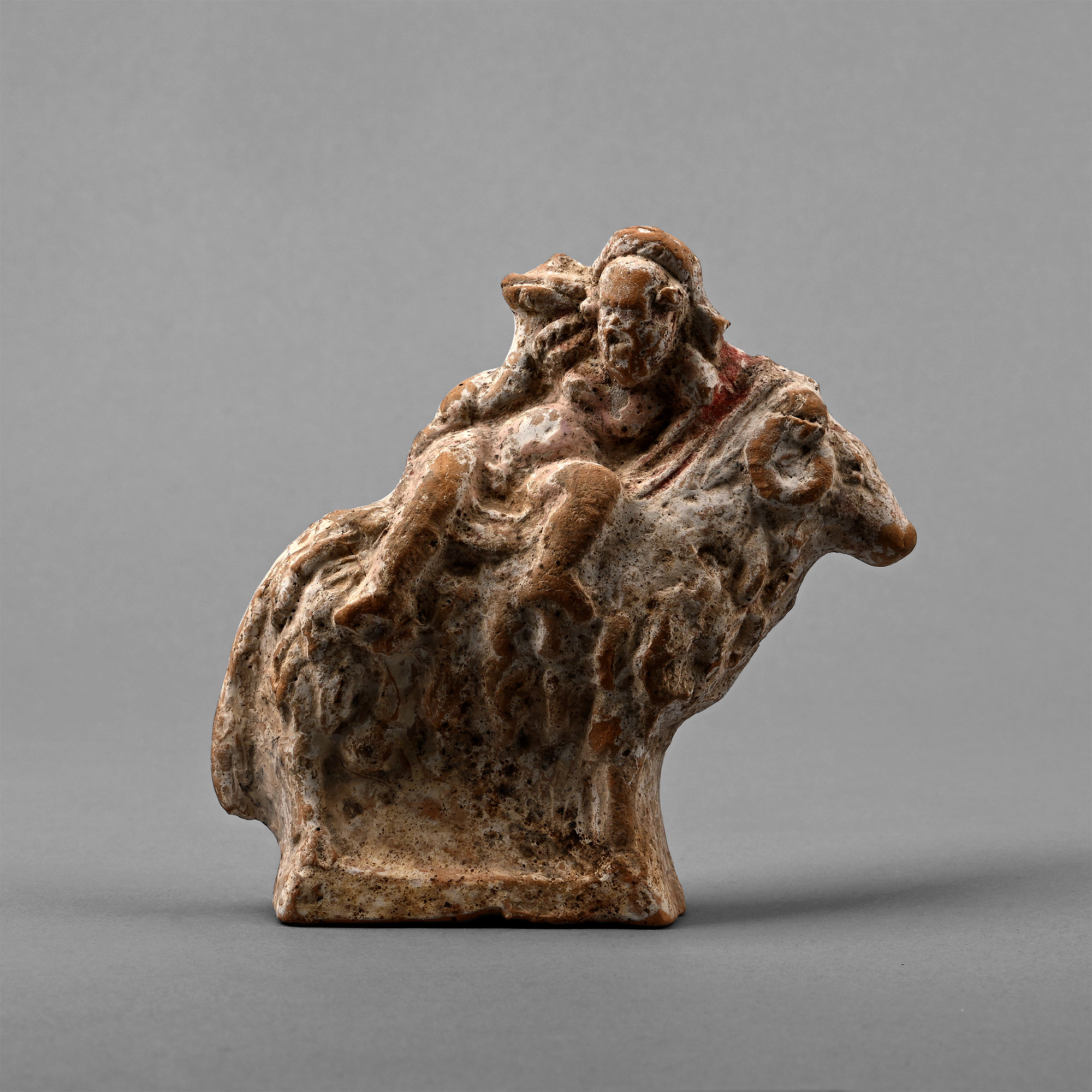 Greek Terracotta of Drunken Silenus Seated on a Ram