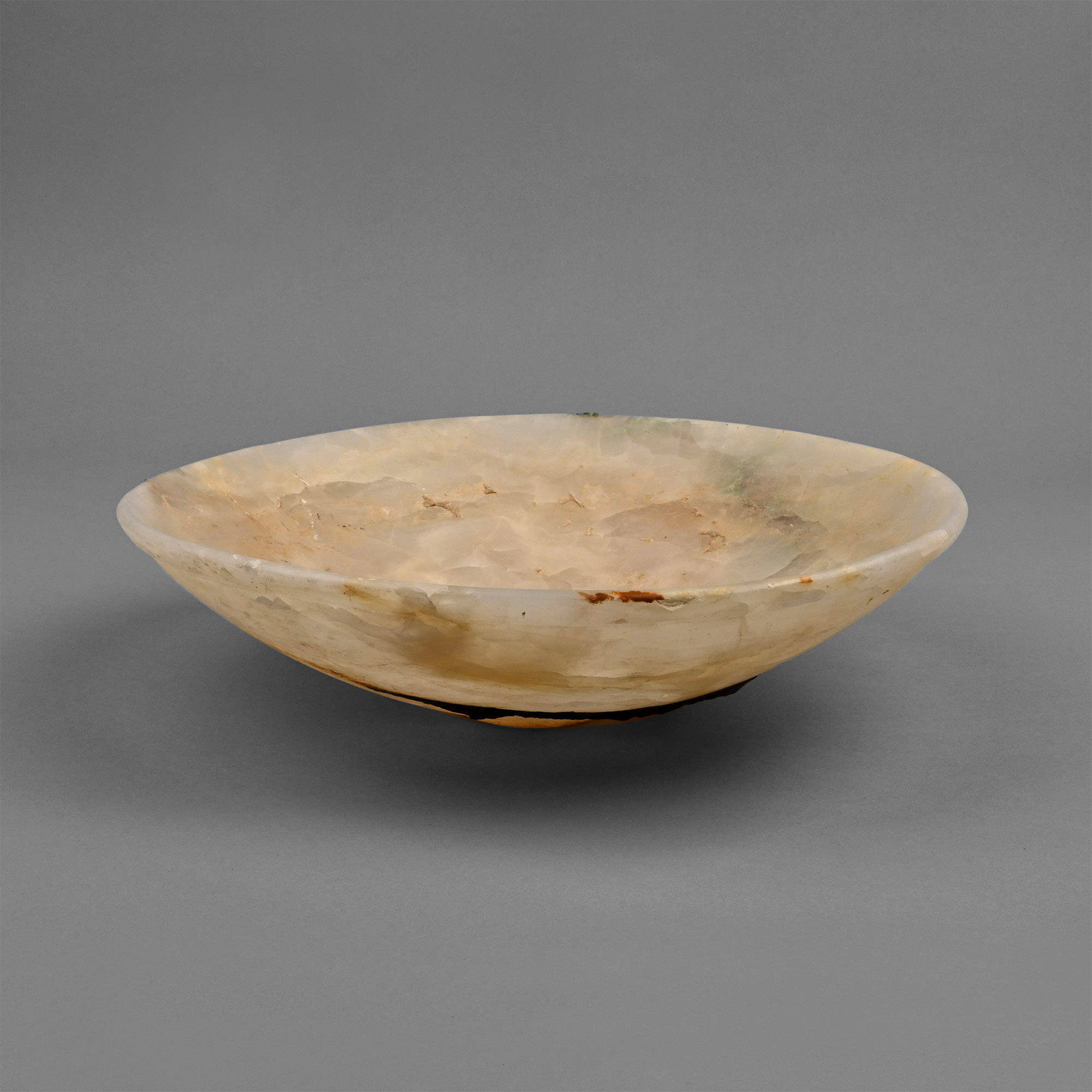 Large Bactrian Alabaster Bowl with Bronze-Encrusted Base