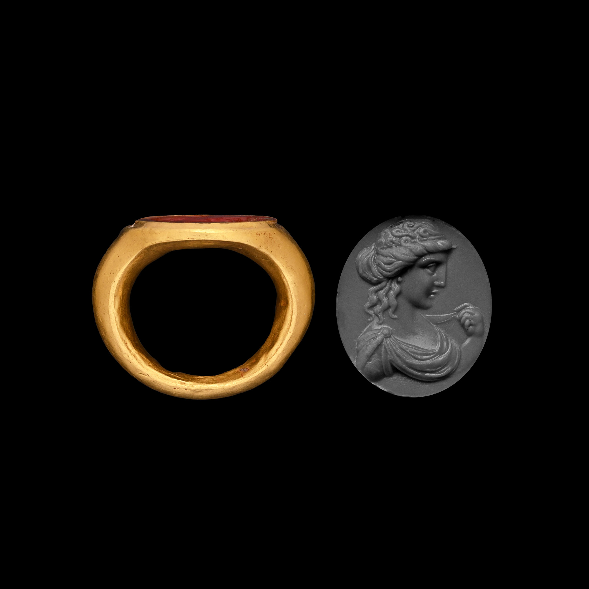 Roman Gold Ring with Carnelian Gemstone with Bust of a Goddess