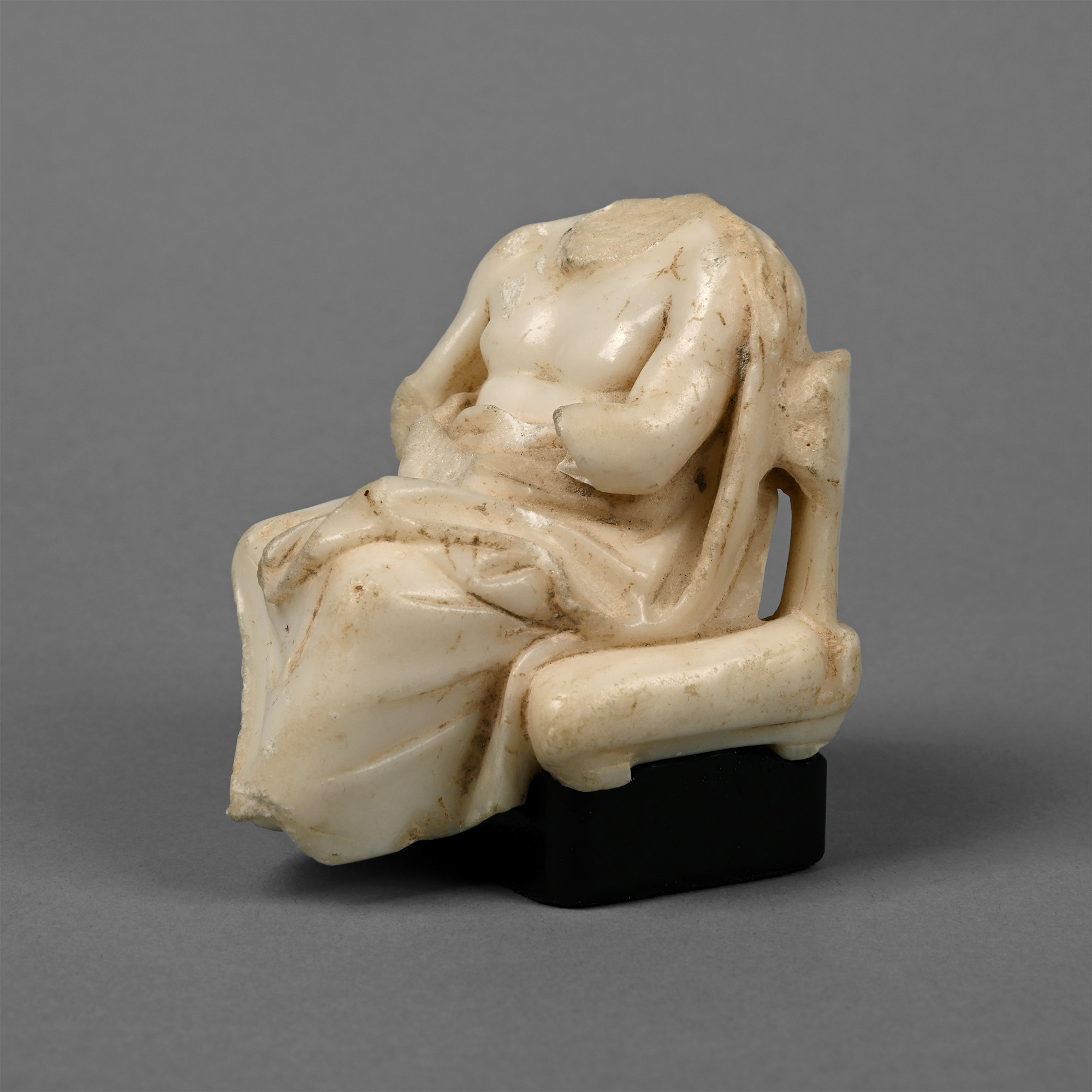 Greek Marble Figure of a Seated God or Philosopher