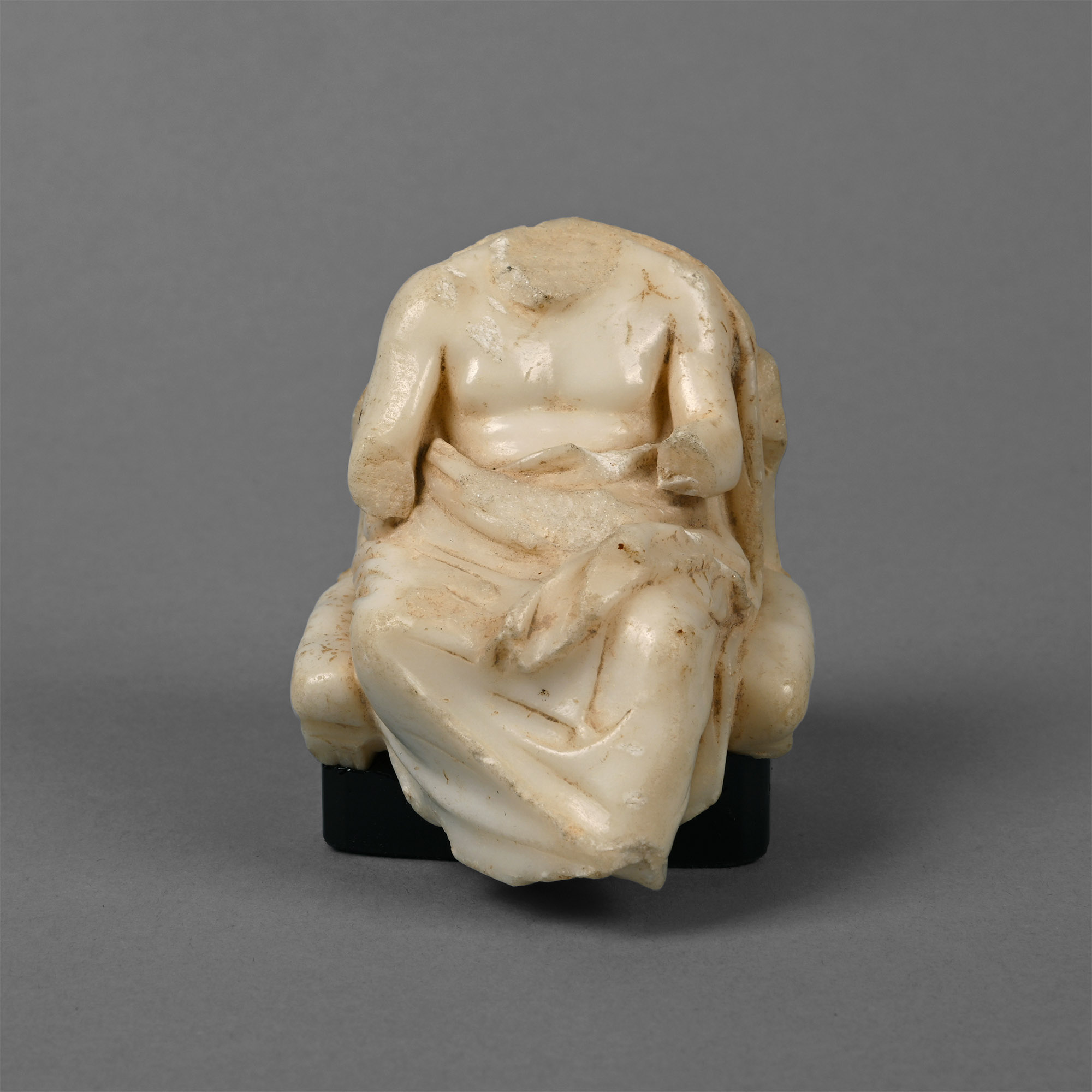 Greek Marble Figure of a Seated God or Philosopher