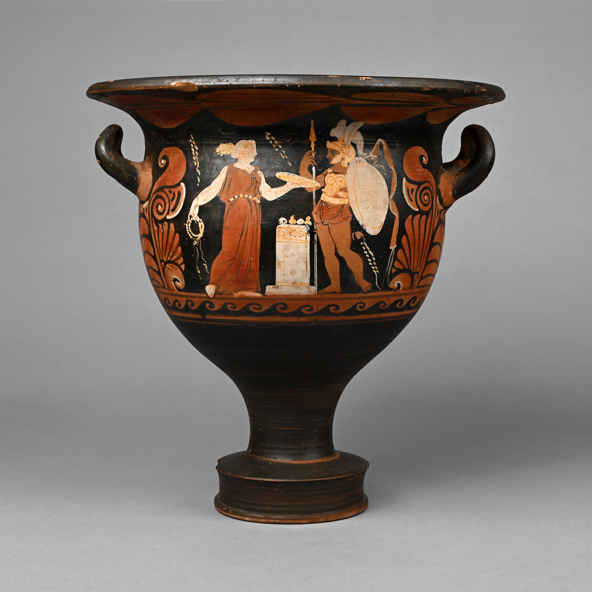 A Greek red-figure bell krater with a warrior funerary scene