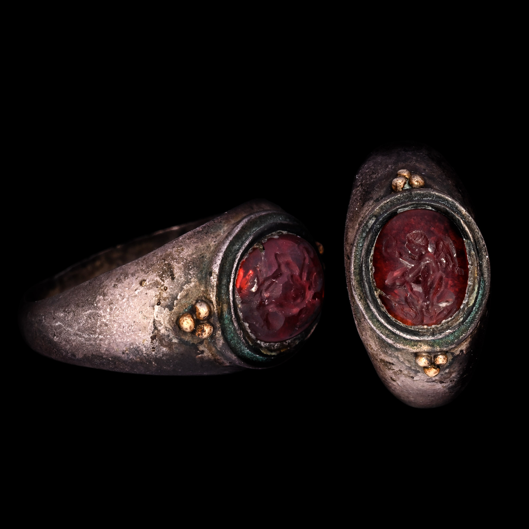 Eastern Roman Silver Ring with Garnet Cabochon with Eros and Goat