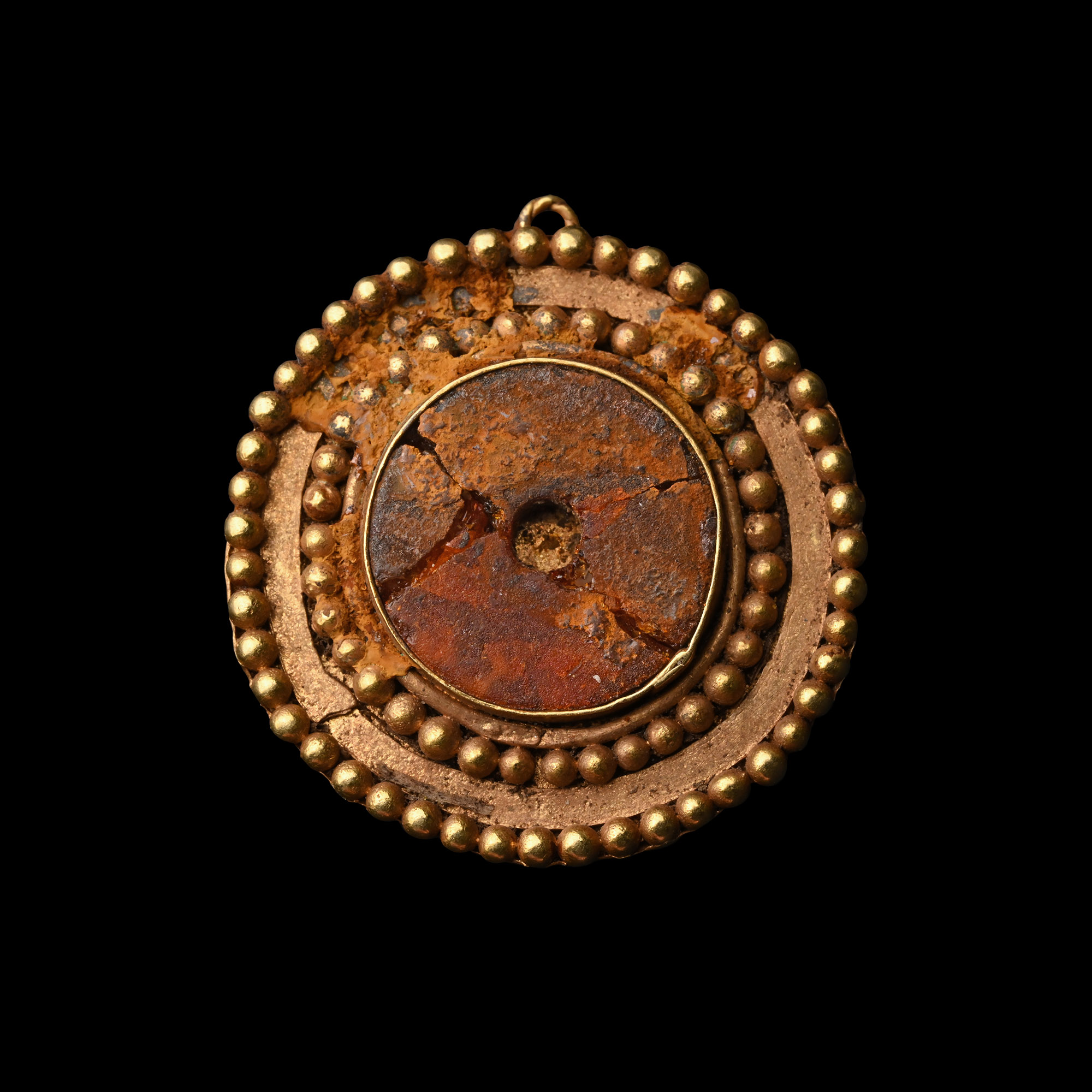 Viking Age Gold Pendant with Amber