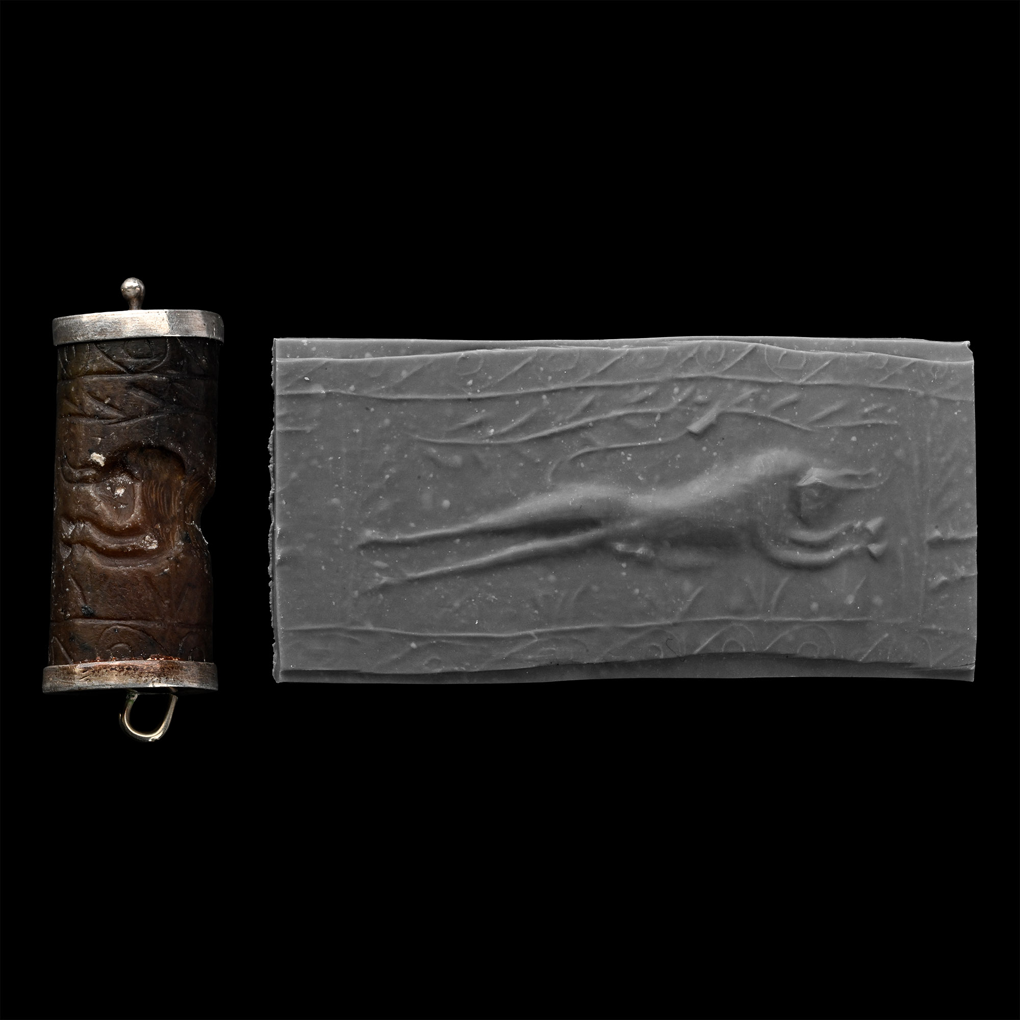 Early Achaemenid Stone Cylinder Seal with Later Silver Casing
