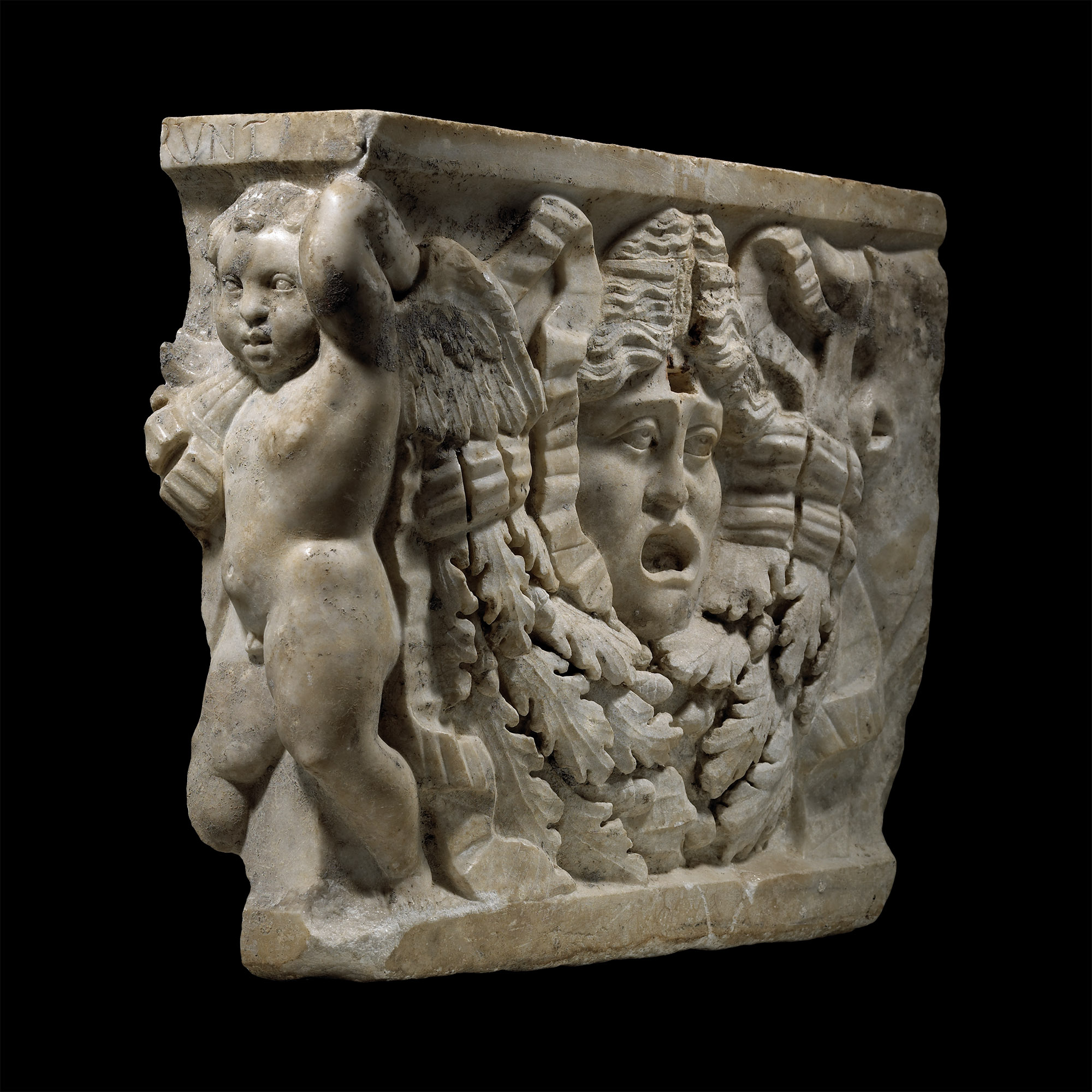 Large Roman Marble Garland Sarcophagus Panel with Theatrical Mask and Eros, the Greek God of Love