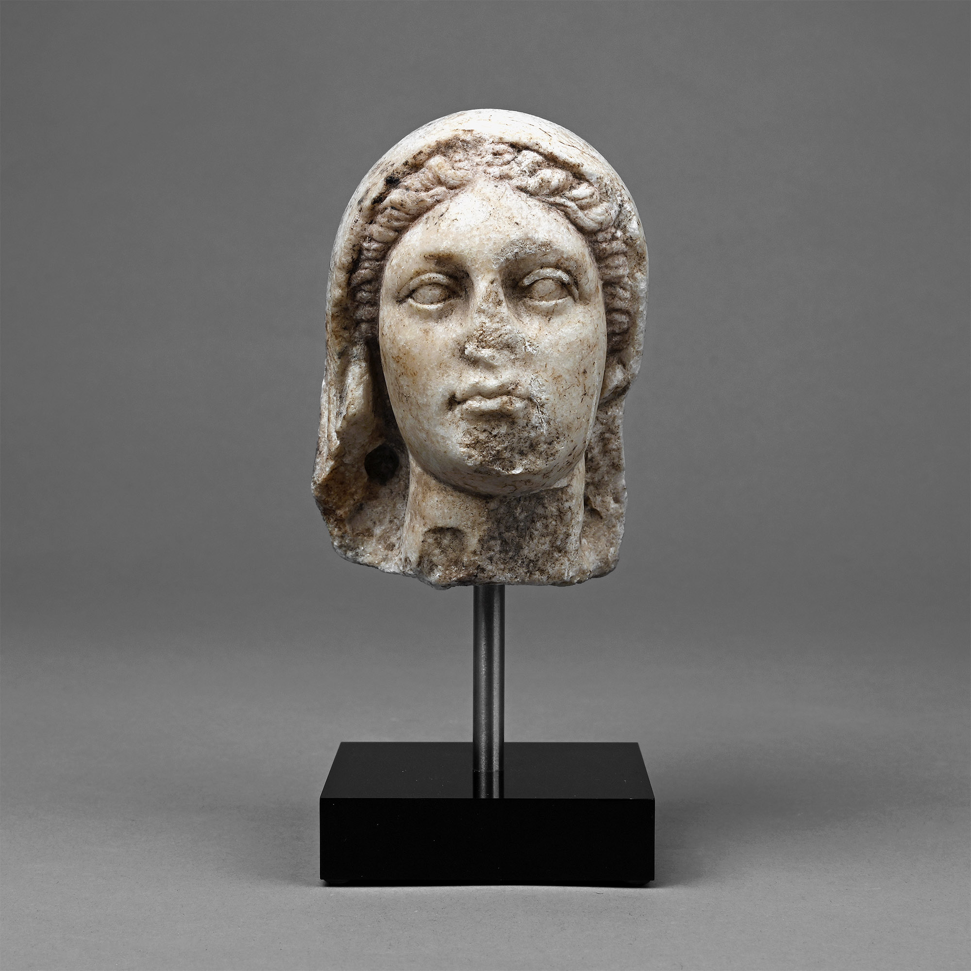 Roman Marble Head of a Veiled Goddess