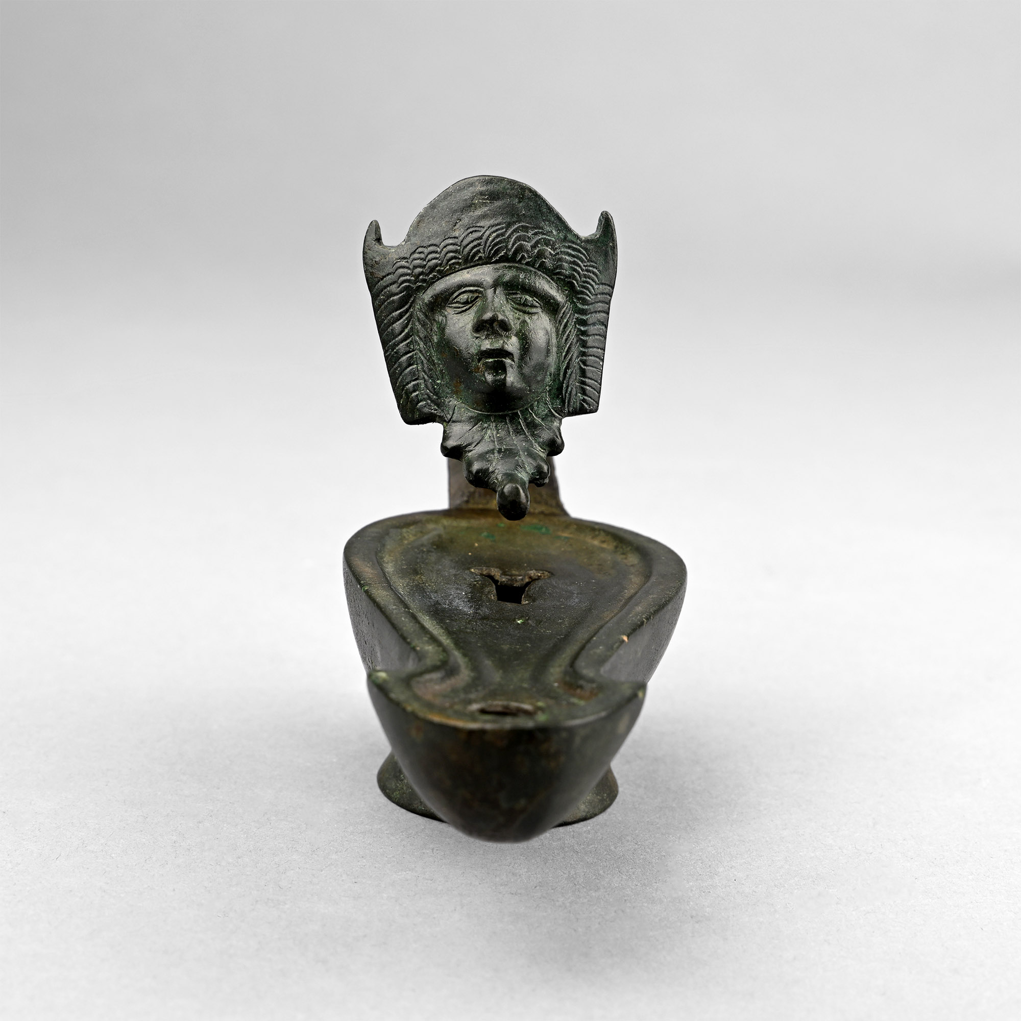 Roman Bronze Oil Lamp with Mask Handle