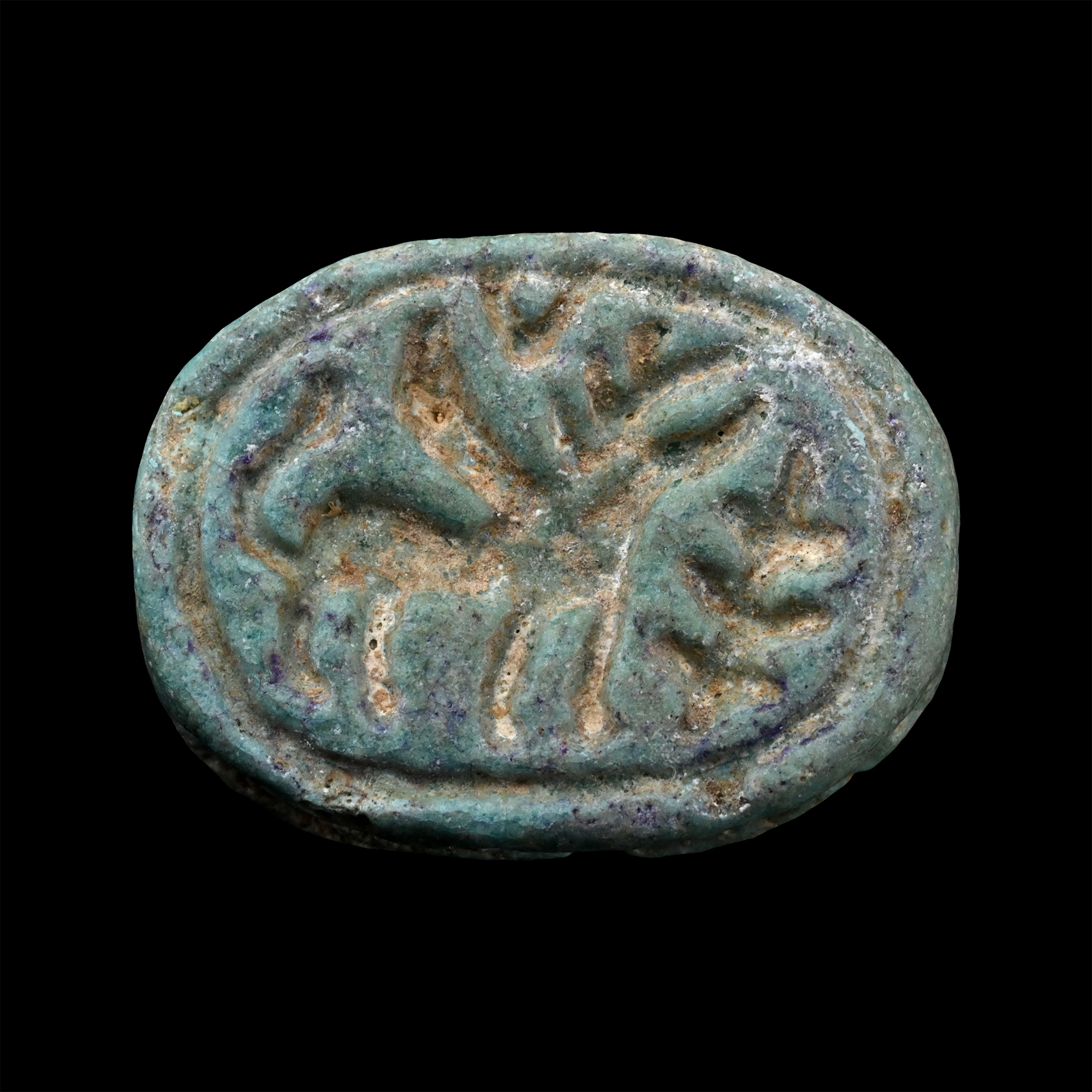 Phoenician Blue Glazed Faience Scaraboid with Winged Beast and Tree