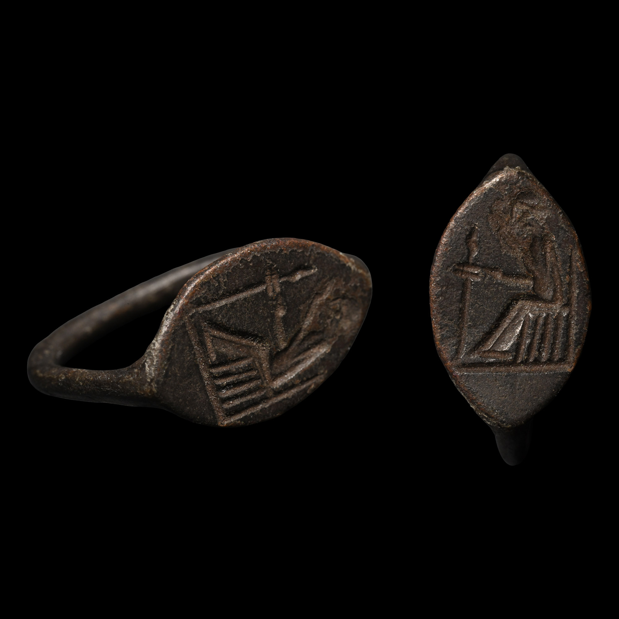 Large Greek Bronze Ring with Seated Figure