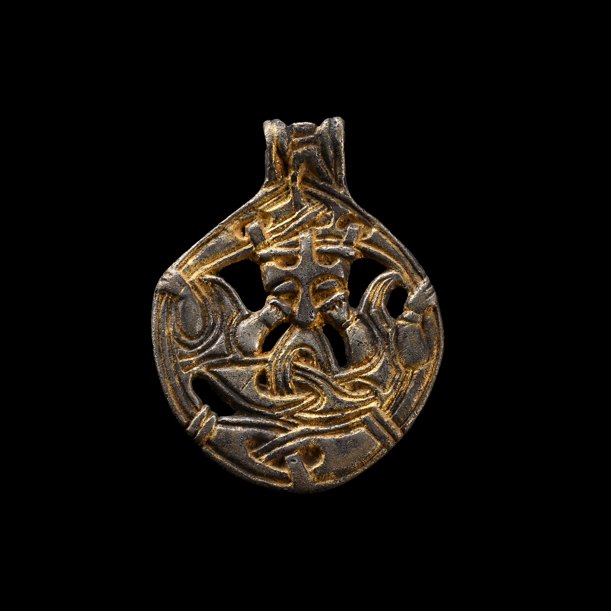 Viking Age Silver-Gilt Gripping Beast Pendant