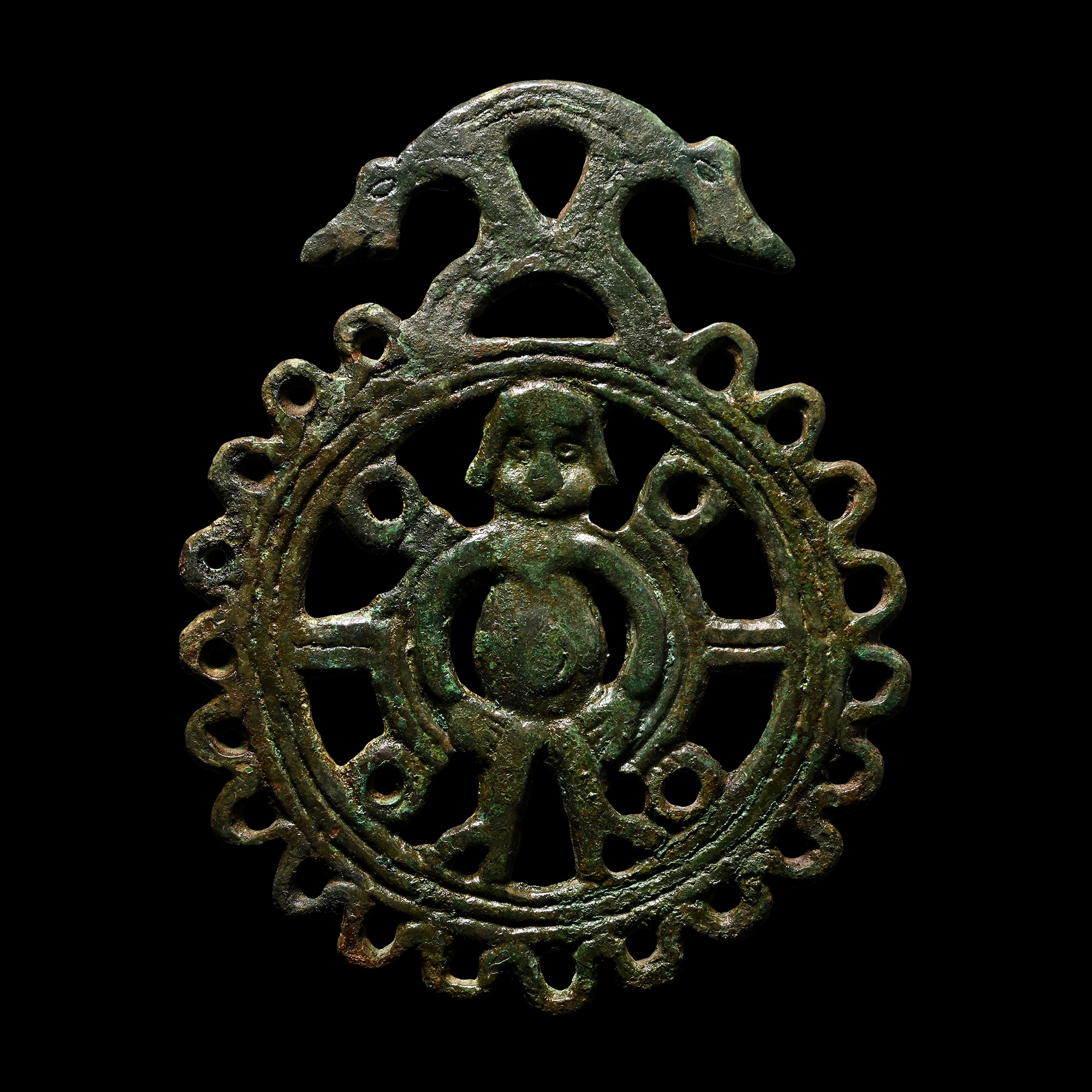 Pre-Viking Bronze Openwork Pendant with Bound Figure and Dragons