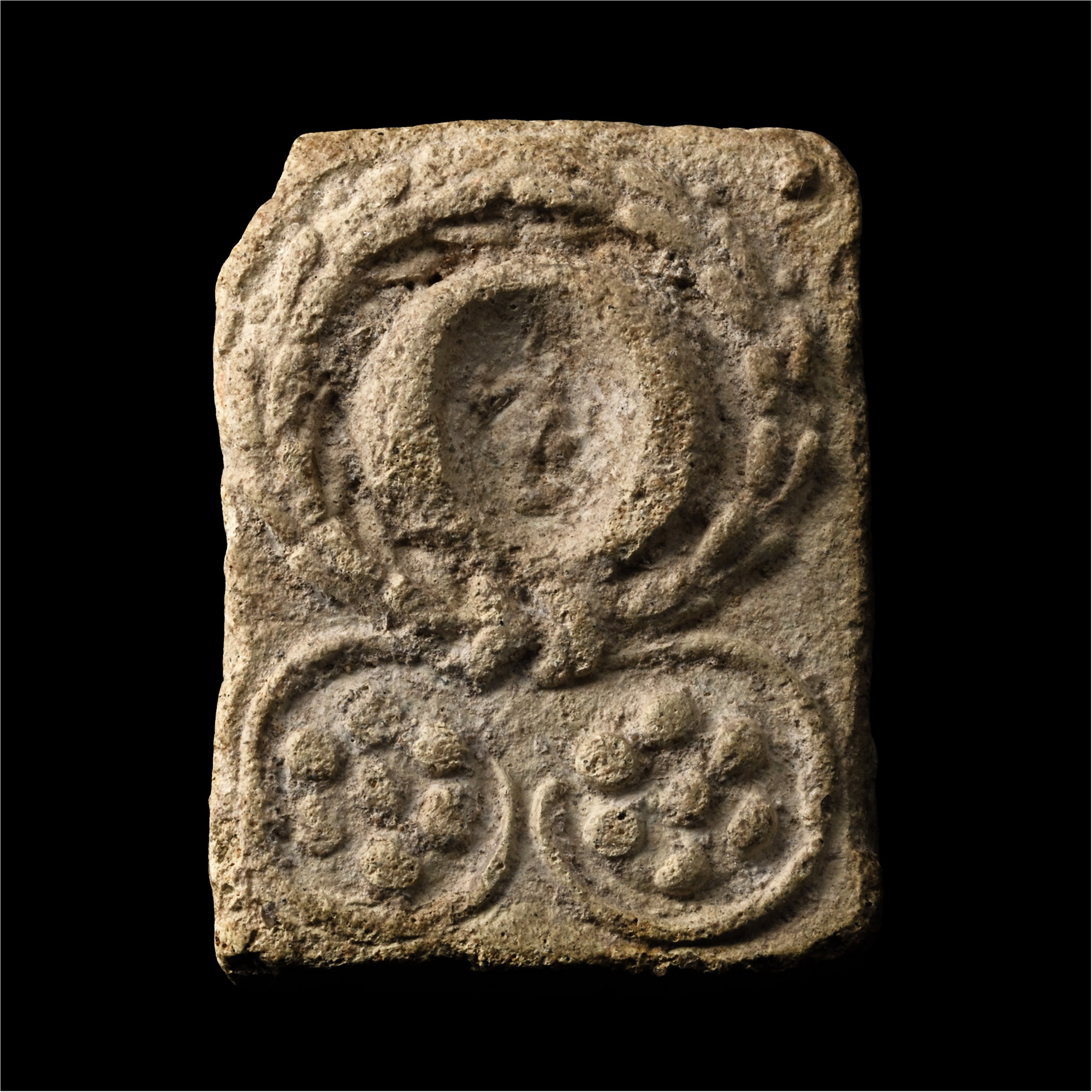 Eastern Roman Terracotta Bifacial Tablet with Figure, Inscription and Wreaths