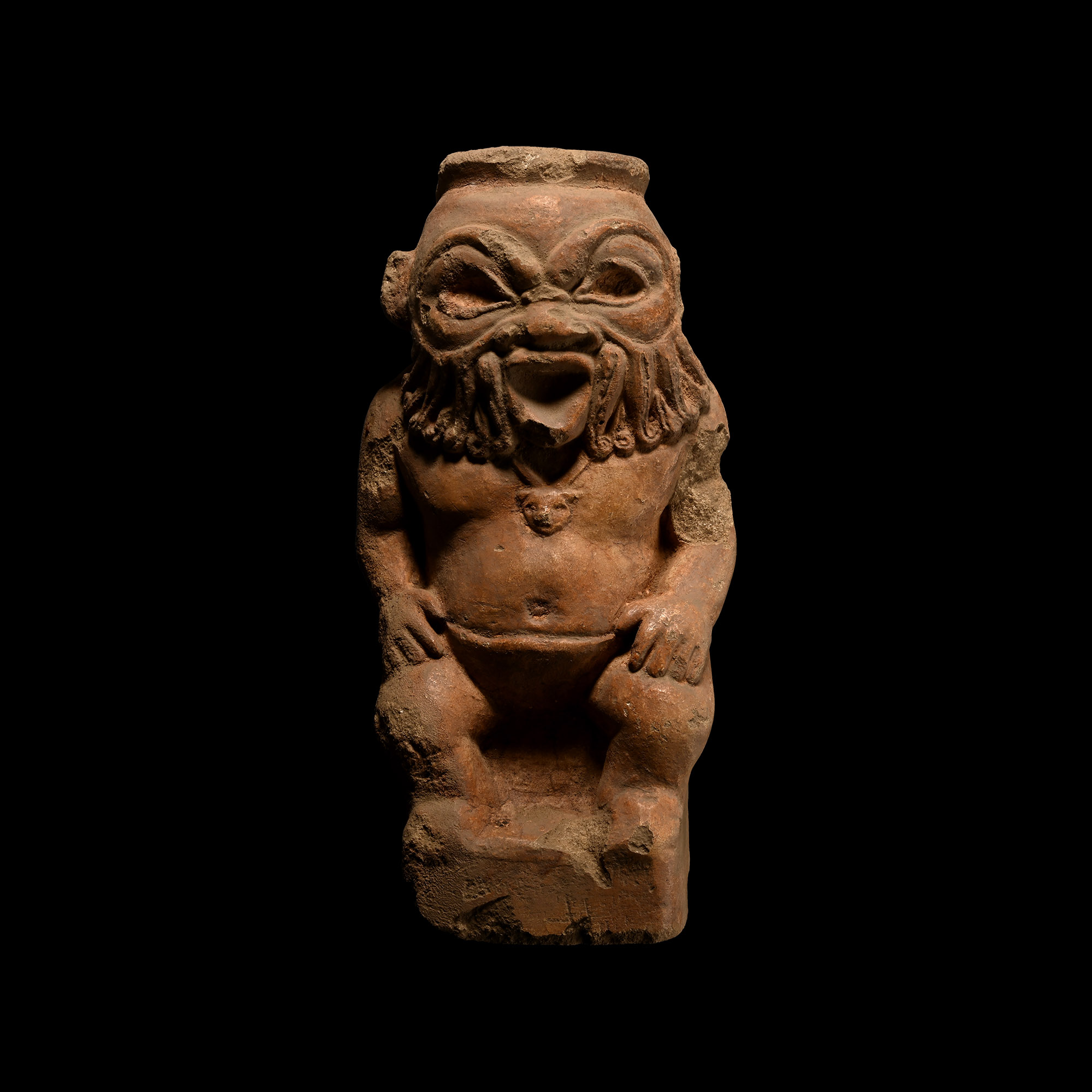 Egypto-Roman Seated Limestone Statuette of Bes