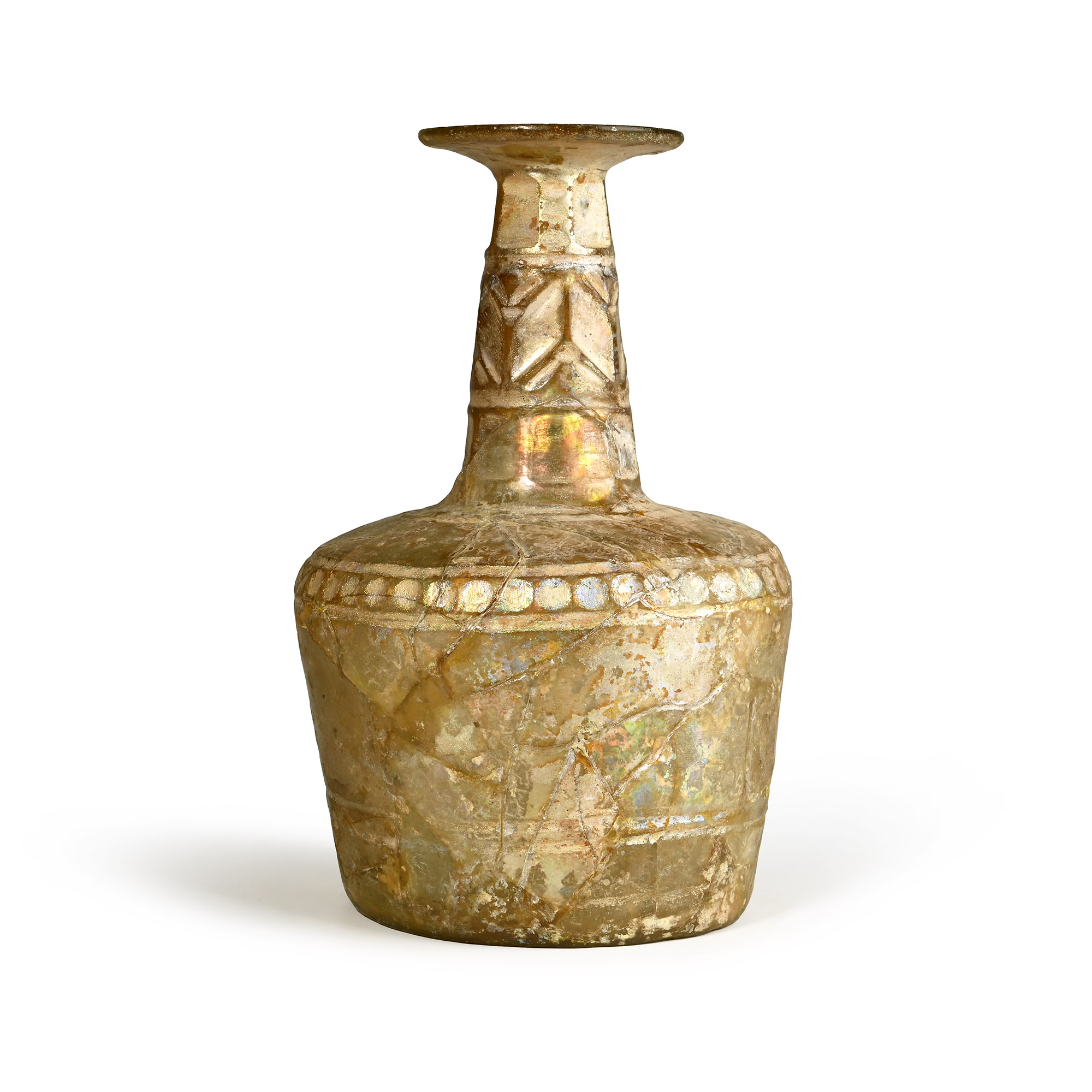 A faceted glass bottle with wheel-cut decoration, probably from Nishapur