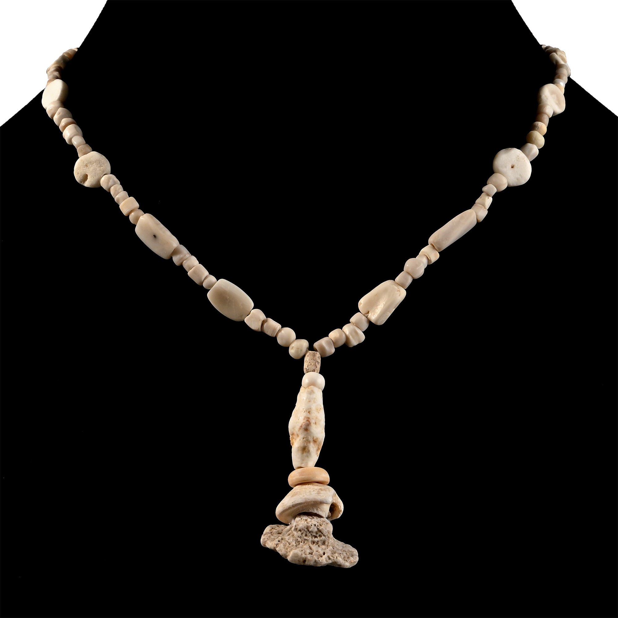 Western Asiatic Cream Glass and Other Bead Necklace String