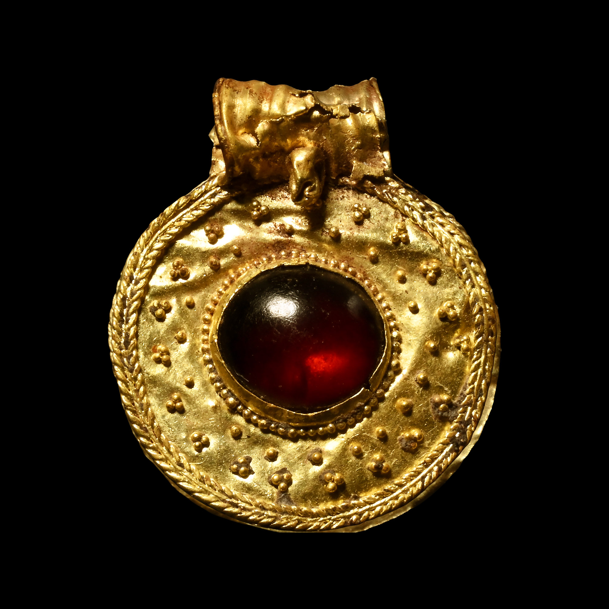 Merovingian Gold Pendant with Cabochon Garnet
