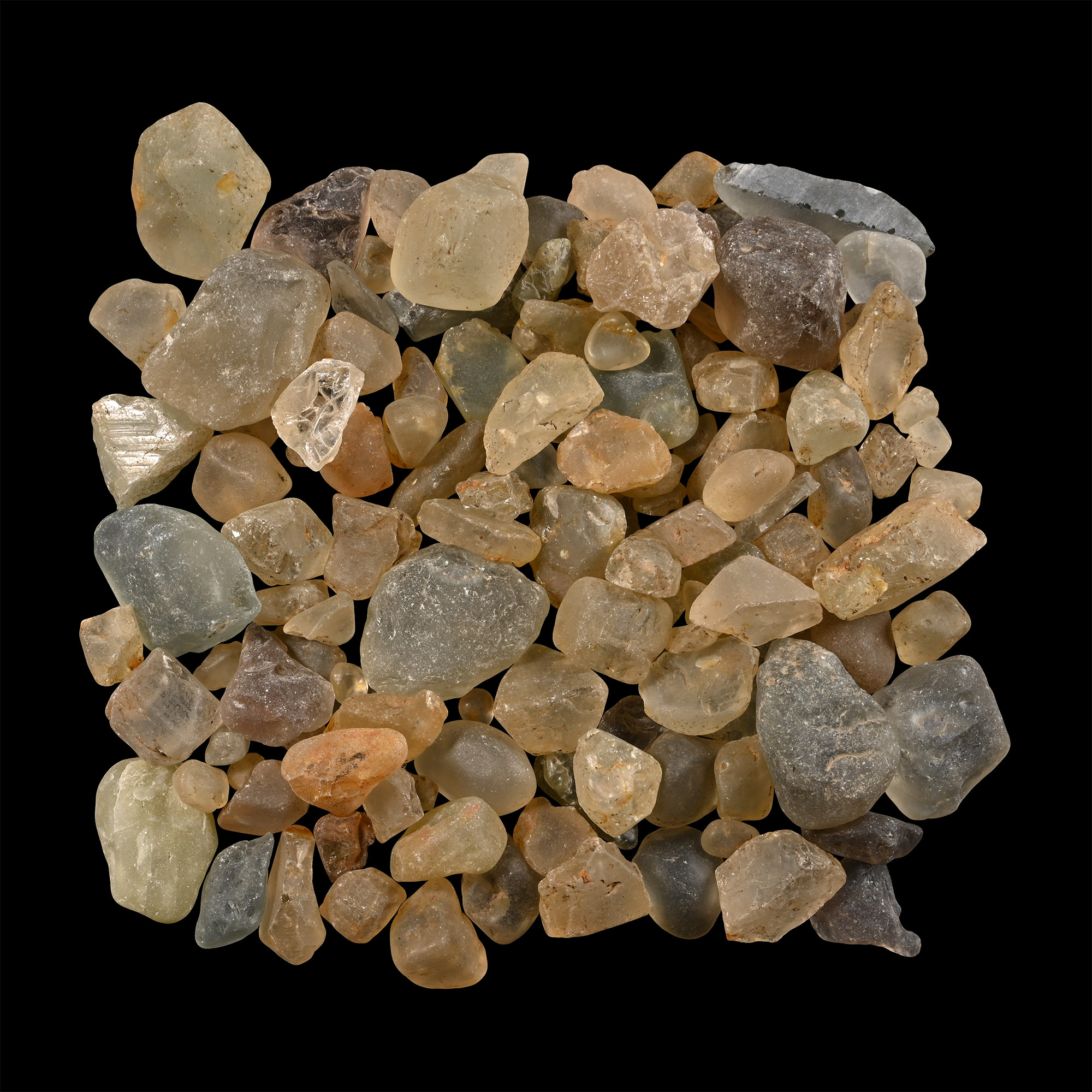 Large Group of One Hundred and Thirty [130] Mixed Colour Topaz Pebbles Totalling 6,500 Carats