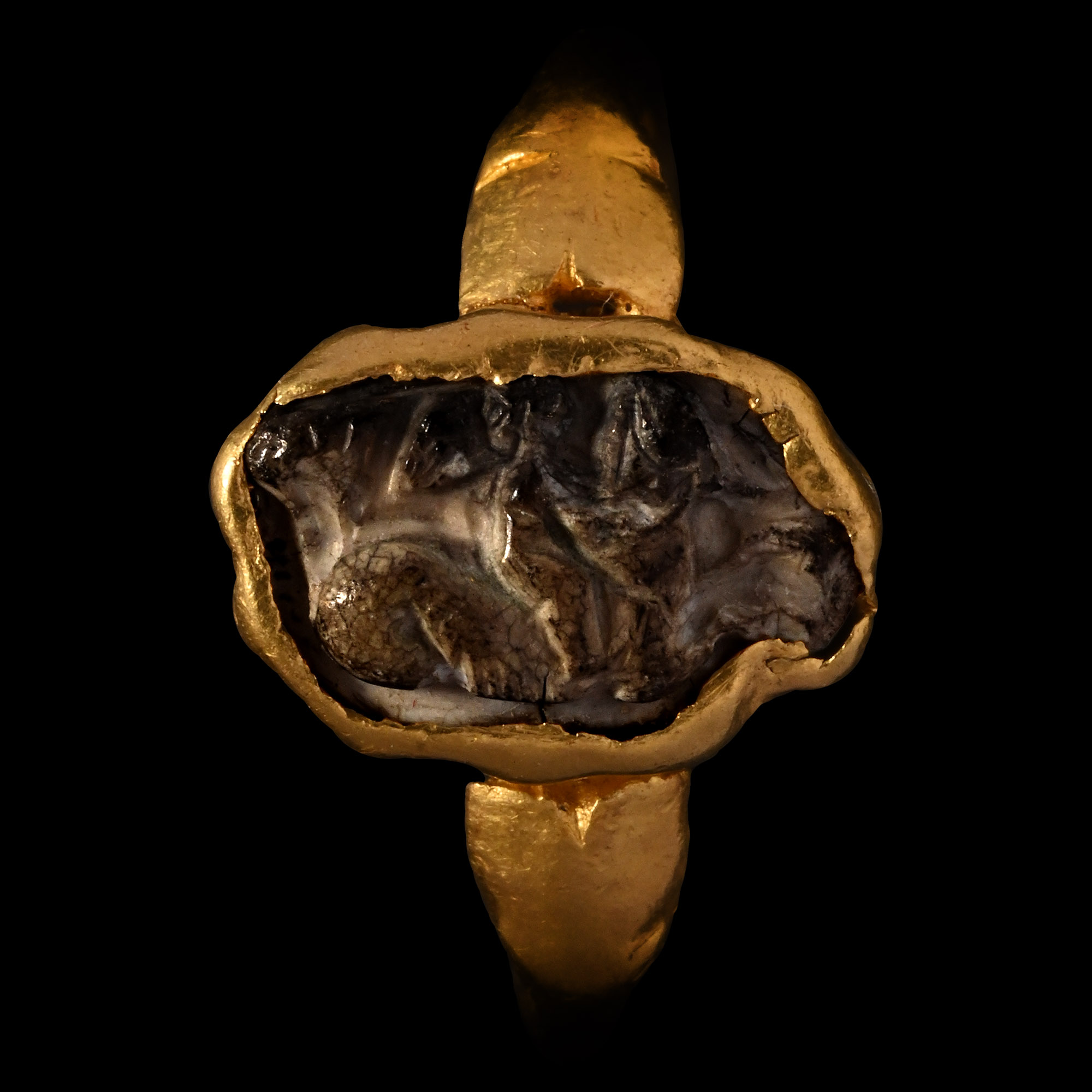 Roman Gold Ring with Burnt Agate Cameo of Eros, the Greek God of Love Riding a Hippocampus