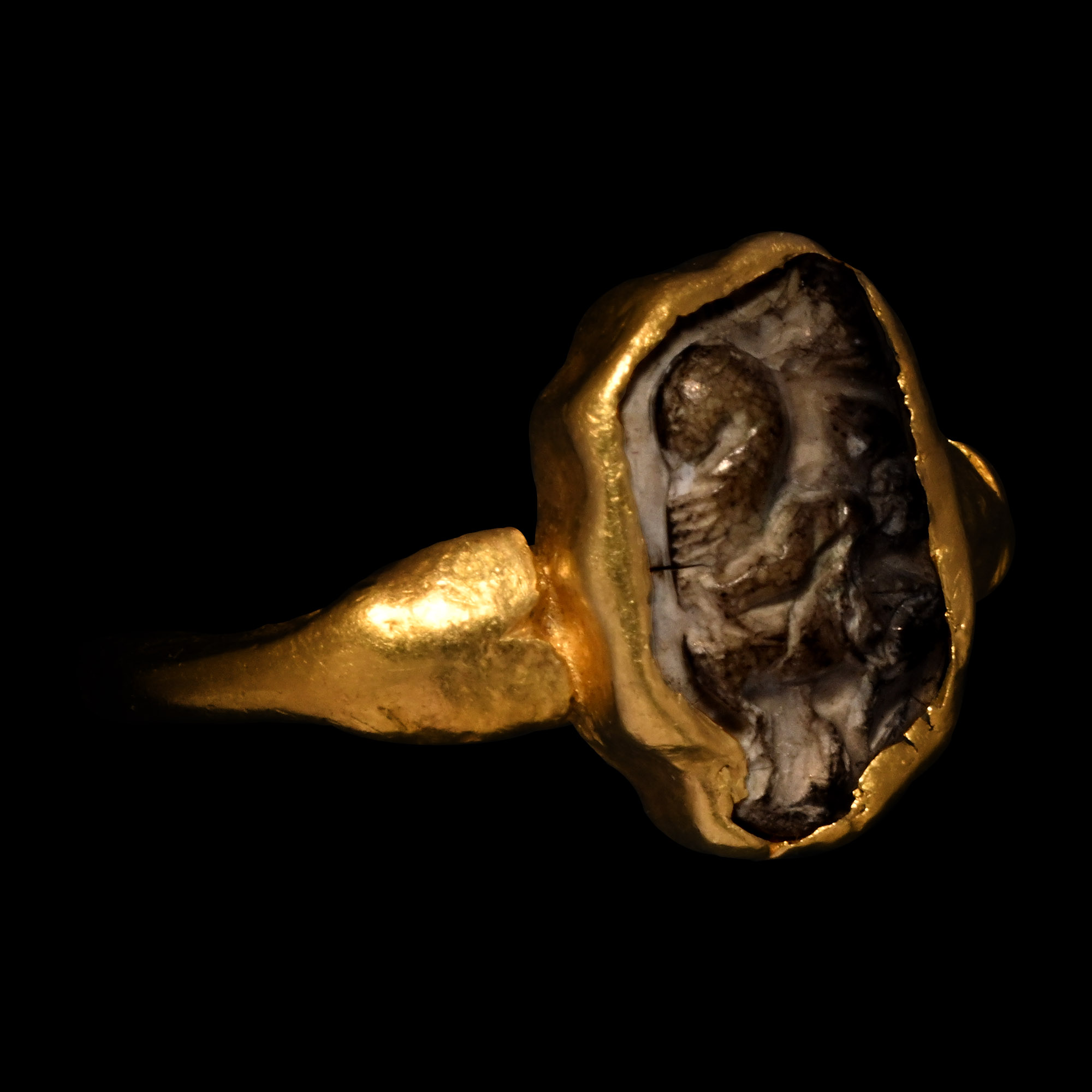 Roman Gold Ring with Burnt Agate Cameo of Eros, the Greek God of Love Riding a Hippocampus