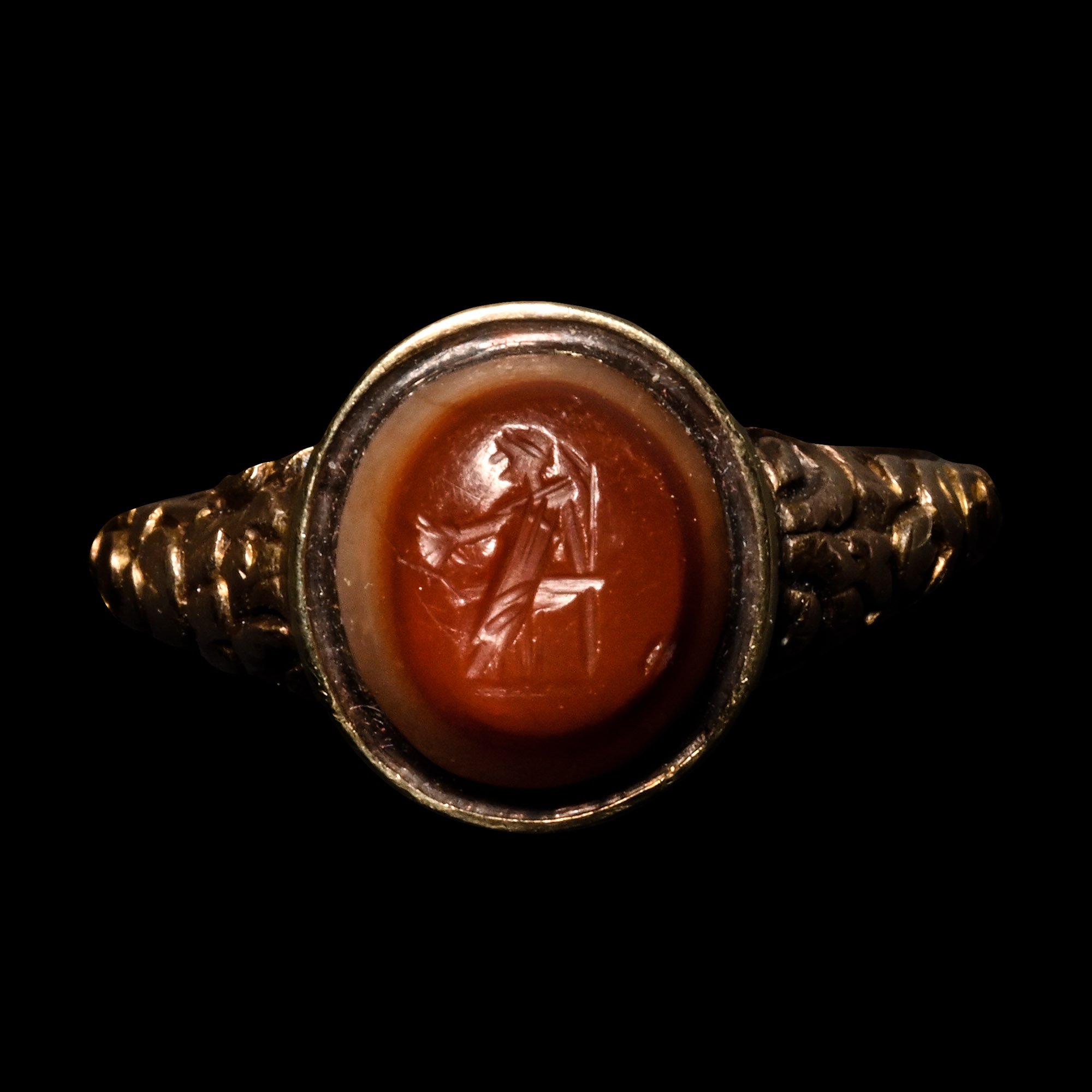 Roman Carnelian Onyx Gemstone of a Seated Muse Set into a Gold Georgian Ring