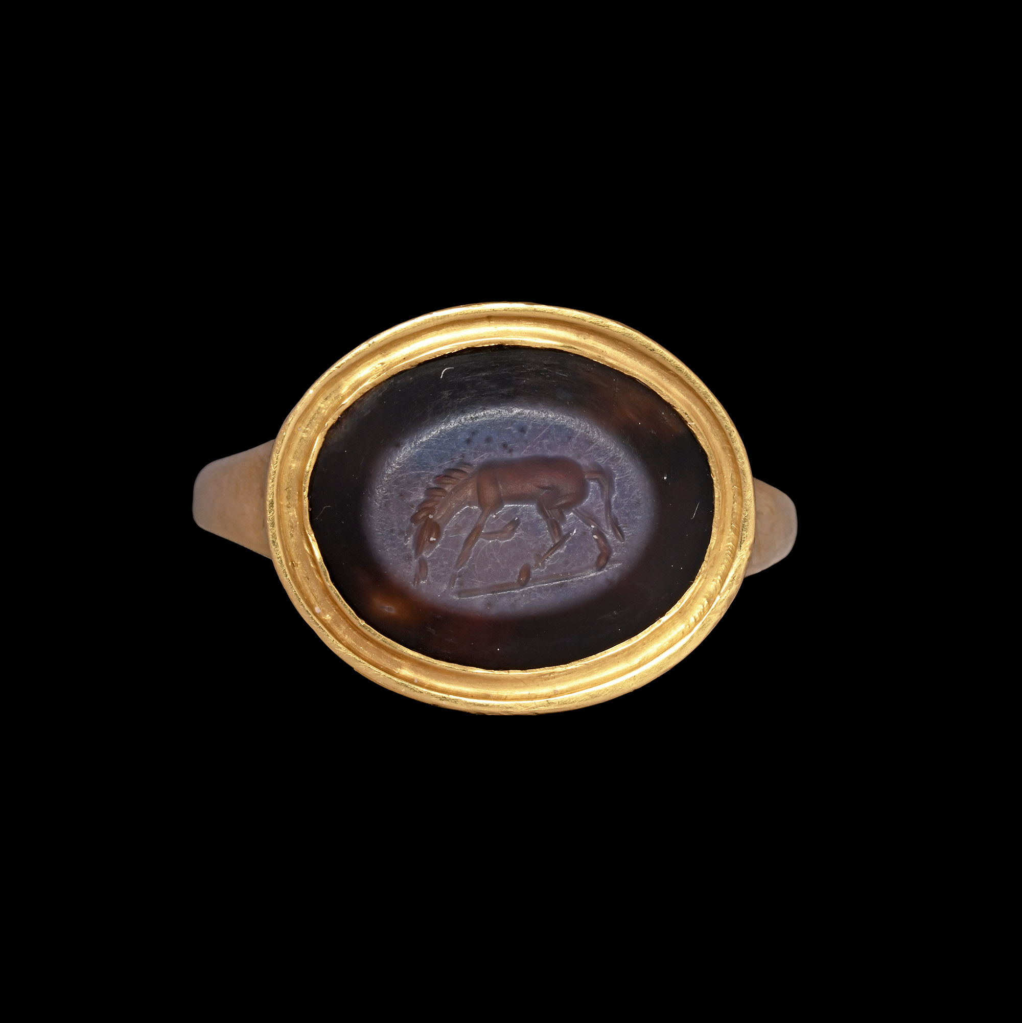 Roman Nicolo Gemstone of a Grazing Horse in Gold Ring