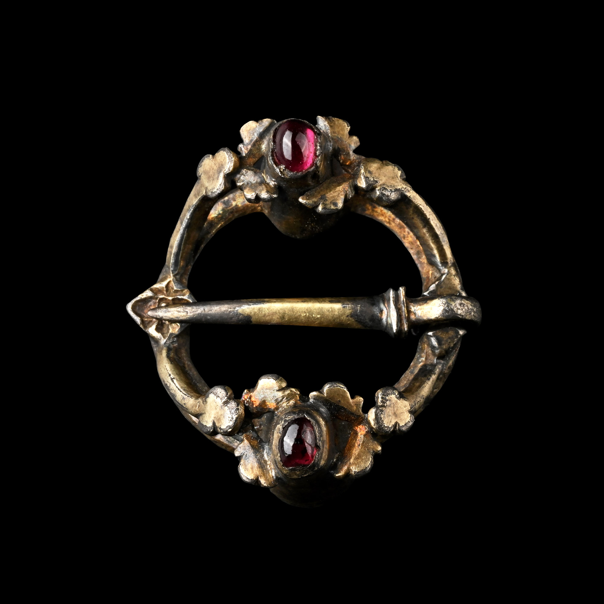 Medieval Silver-Gilt Ring Brooch with Garnet Cabochons