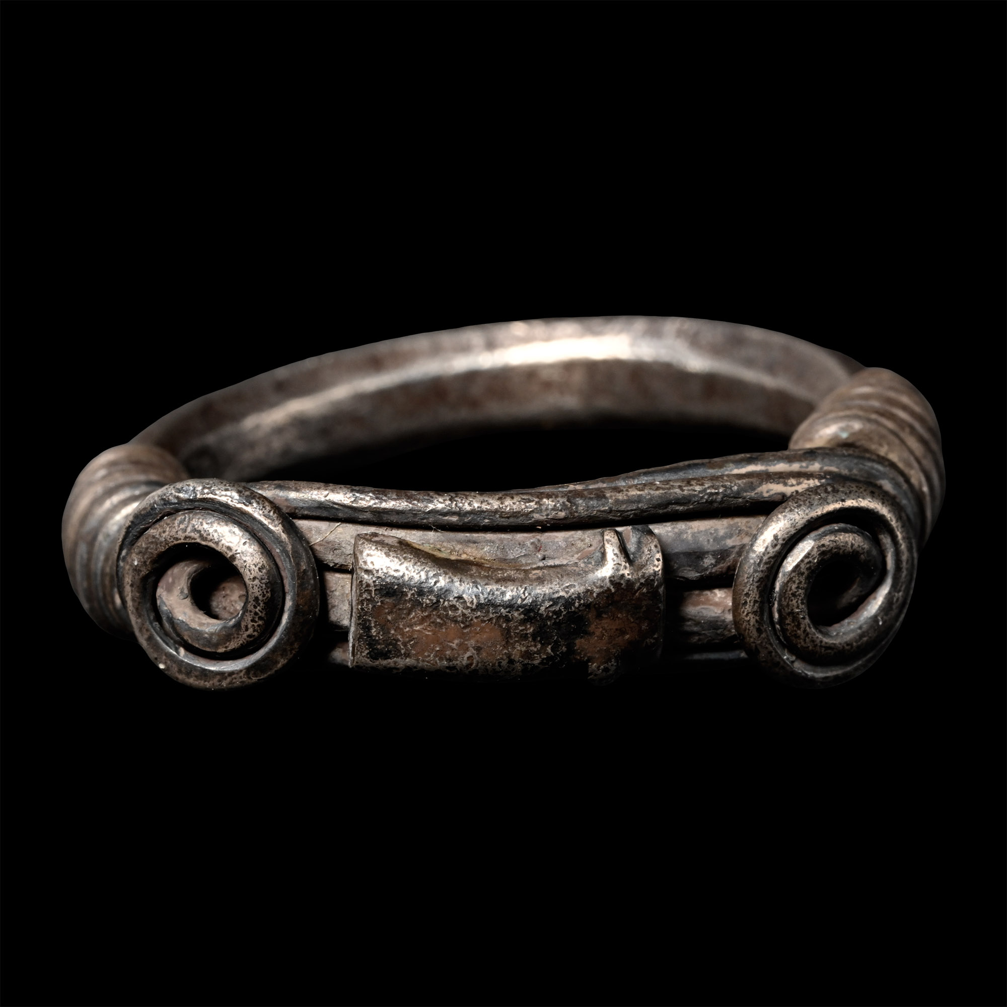 Central Balkans Silver Ring with Spiralled Terminals and Axe Motif Ornament