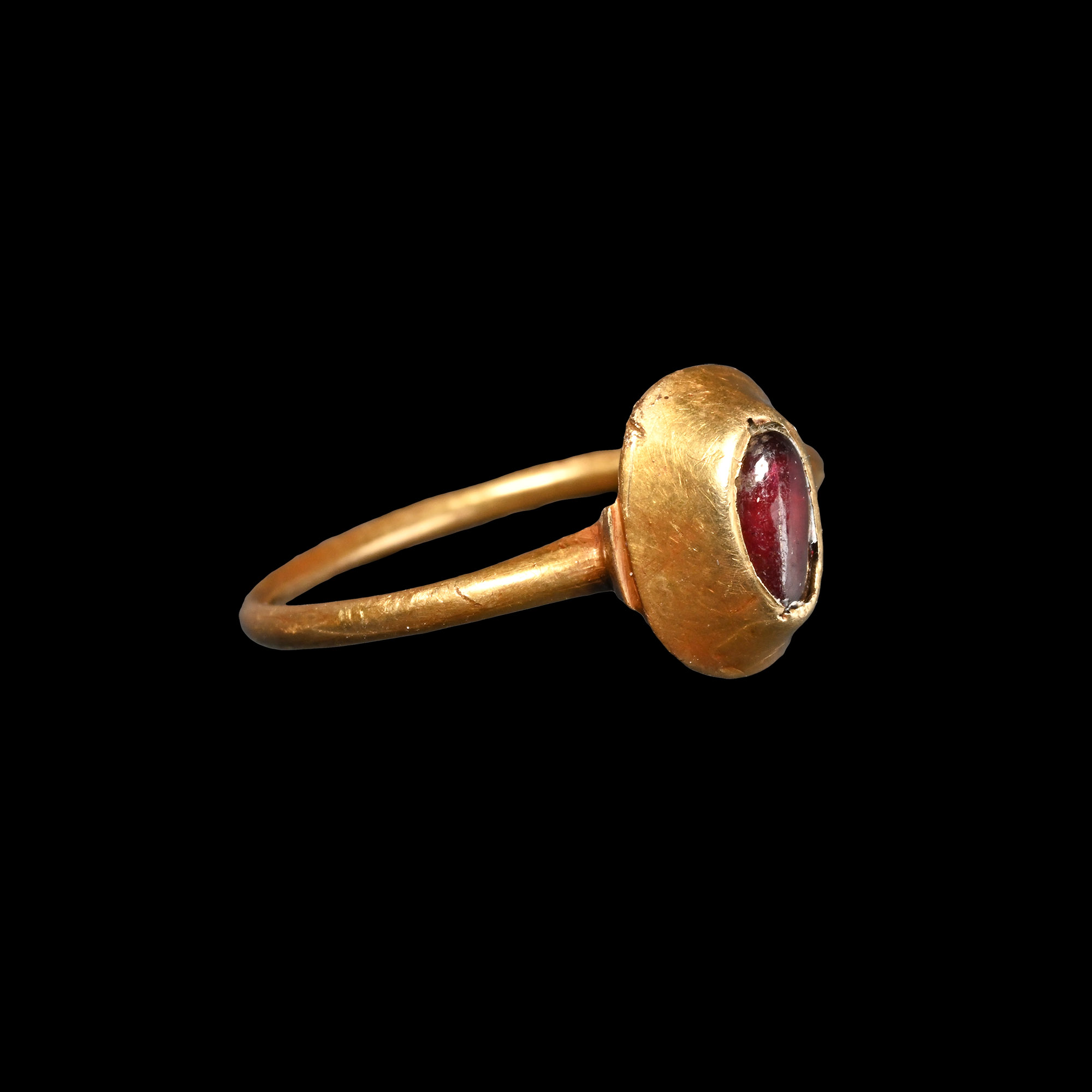 Medieval Gold Ring with Cabochon Garnet
