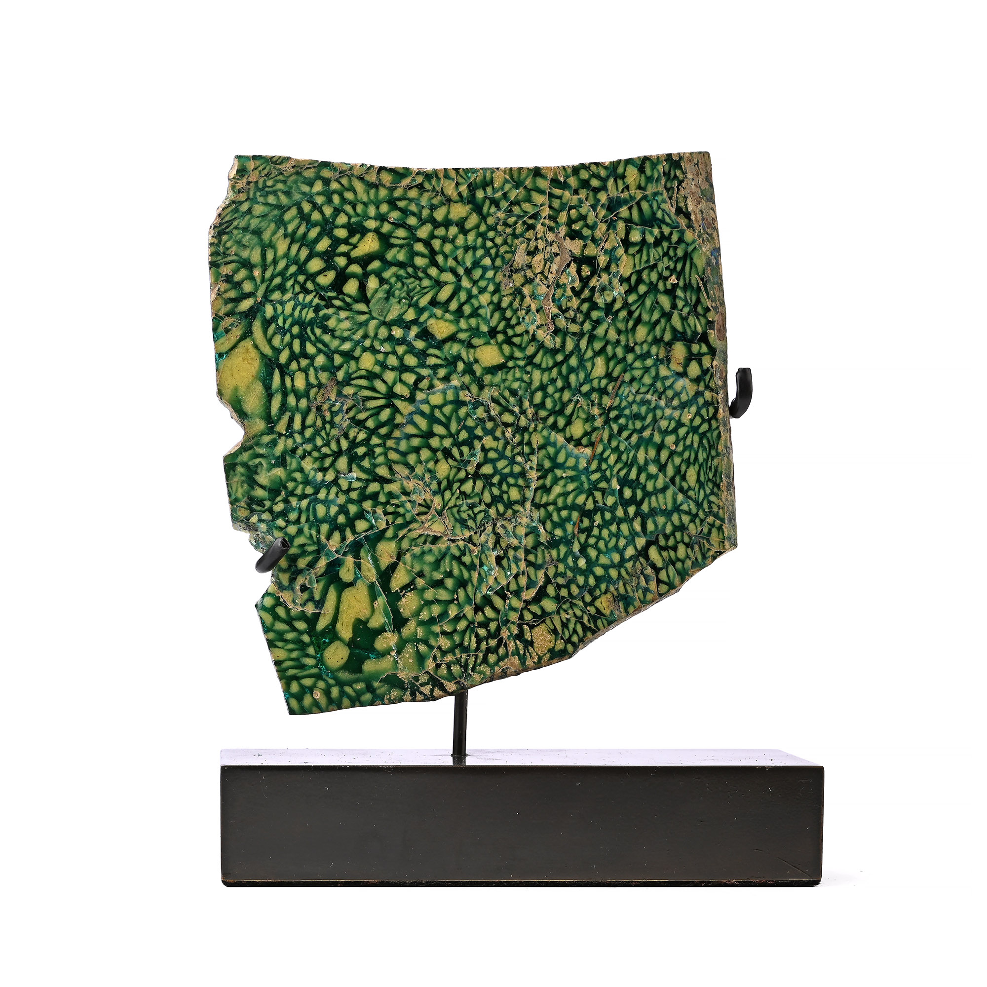 A large Roman green mosaic glass fragment with floret canes