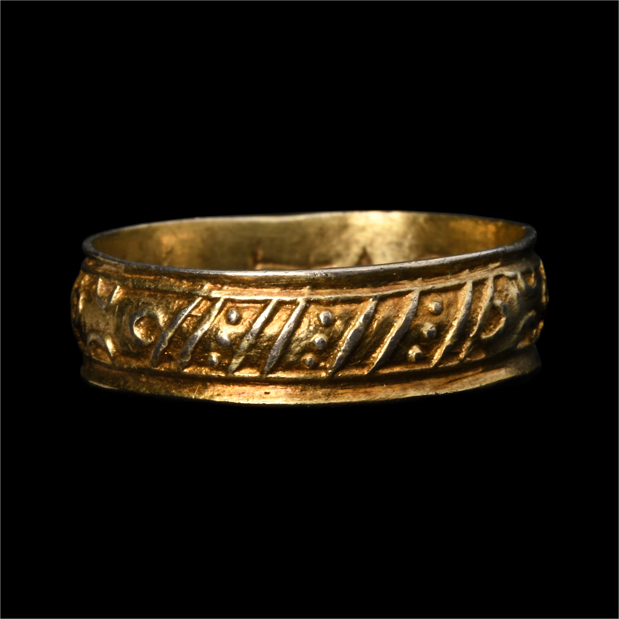 Tudor Period Silver-Gilt Decorated 'Love God' Posy Ring