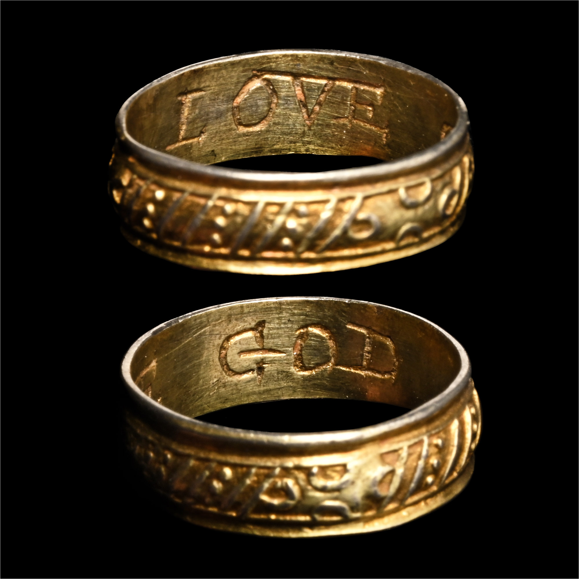 Tudor Period Silver-Gilt Decorated 'Love God' Posy Ring