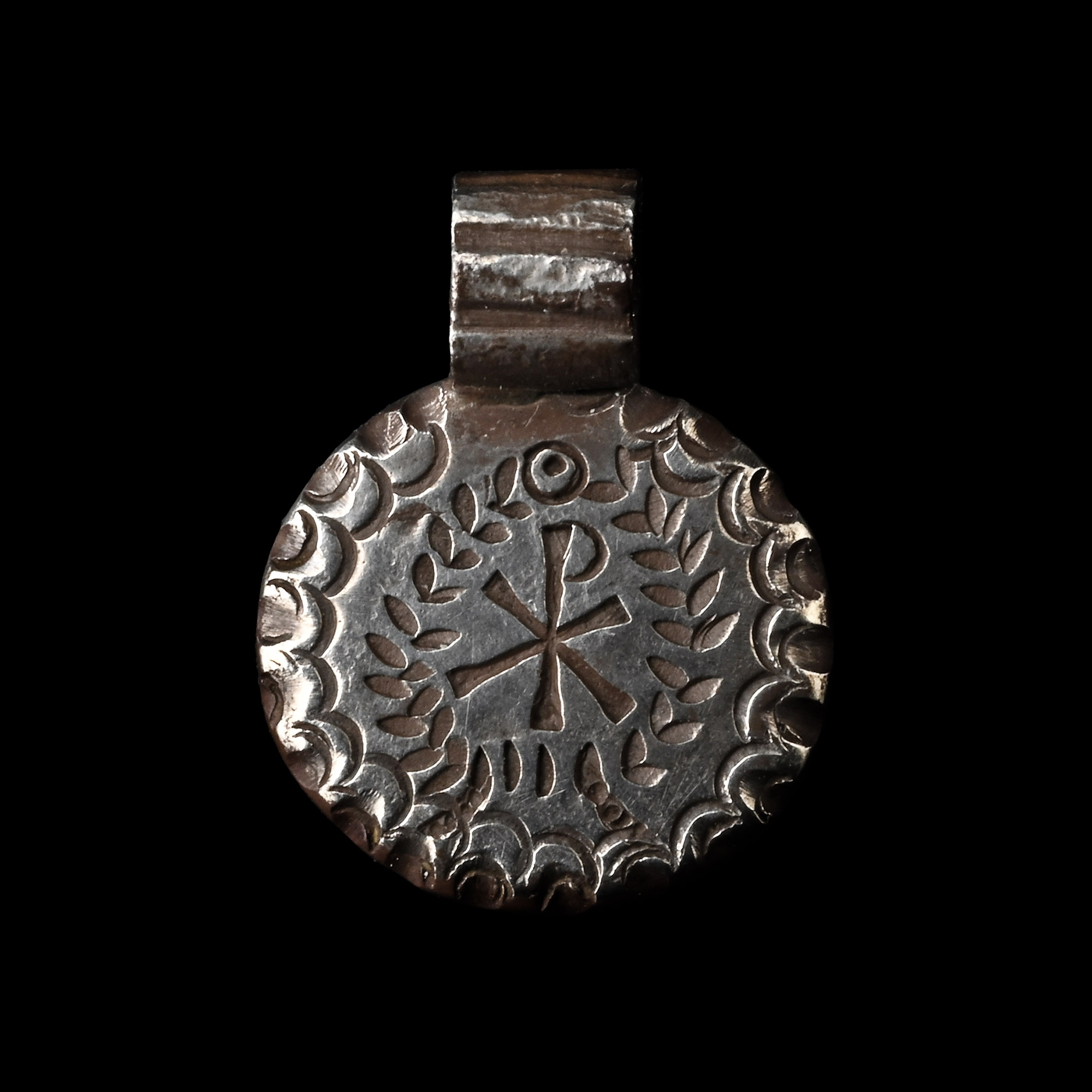 Post Medieval Silver Pendant with Chi Rho in Wreath