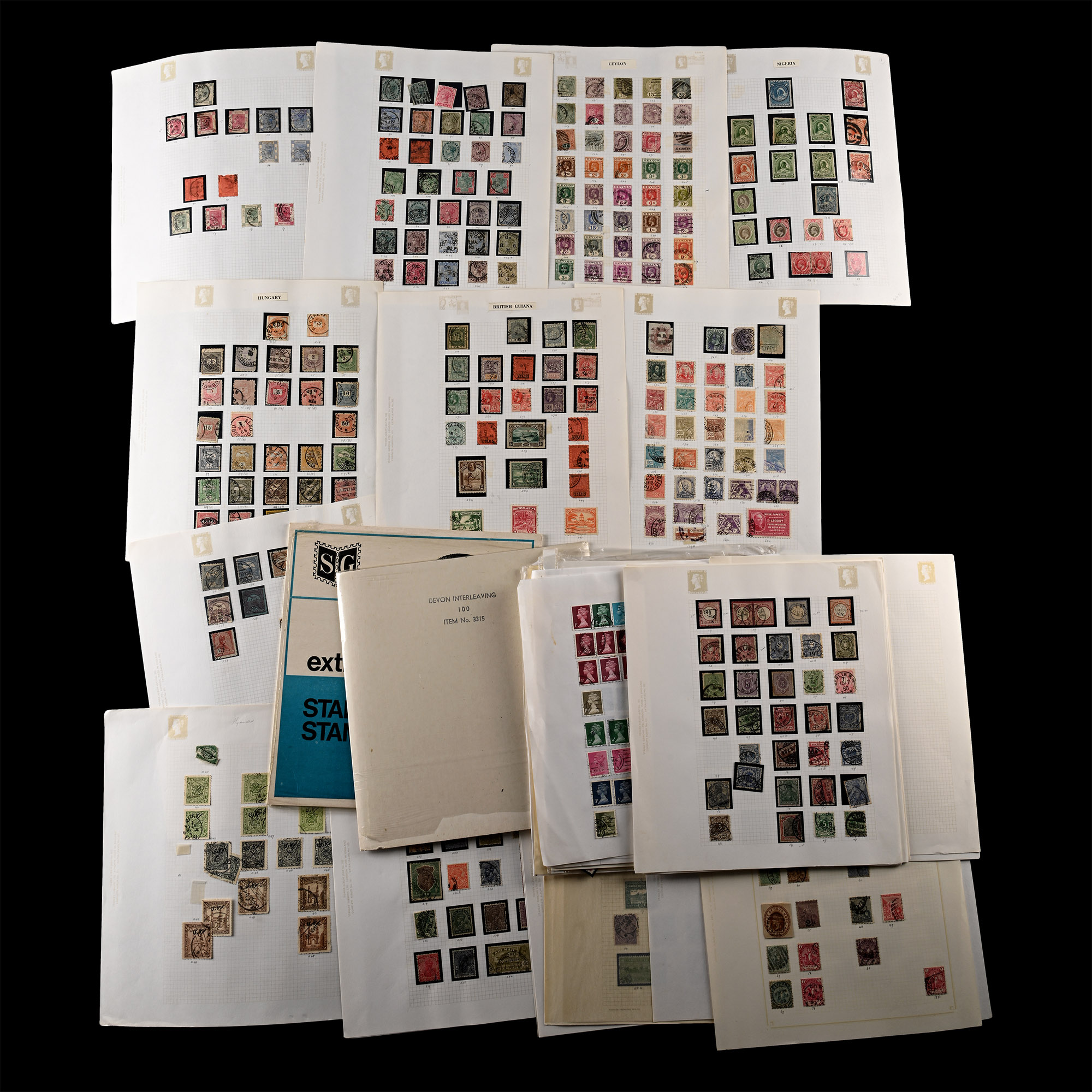 Mixed Group of World Stamps on Album Leaves