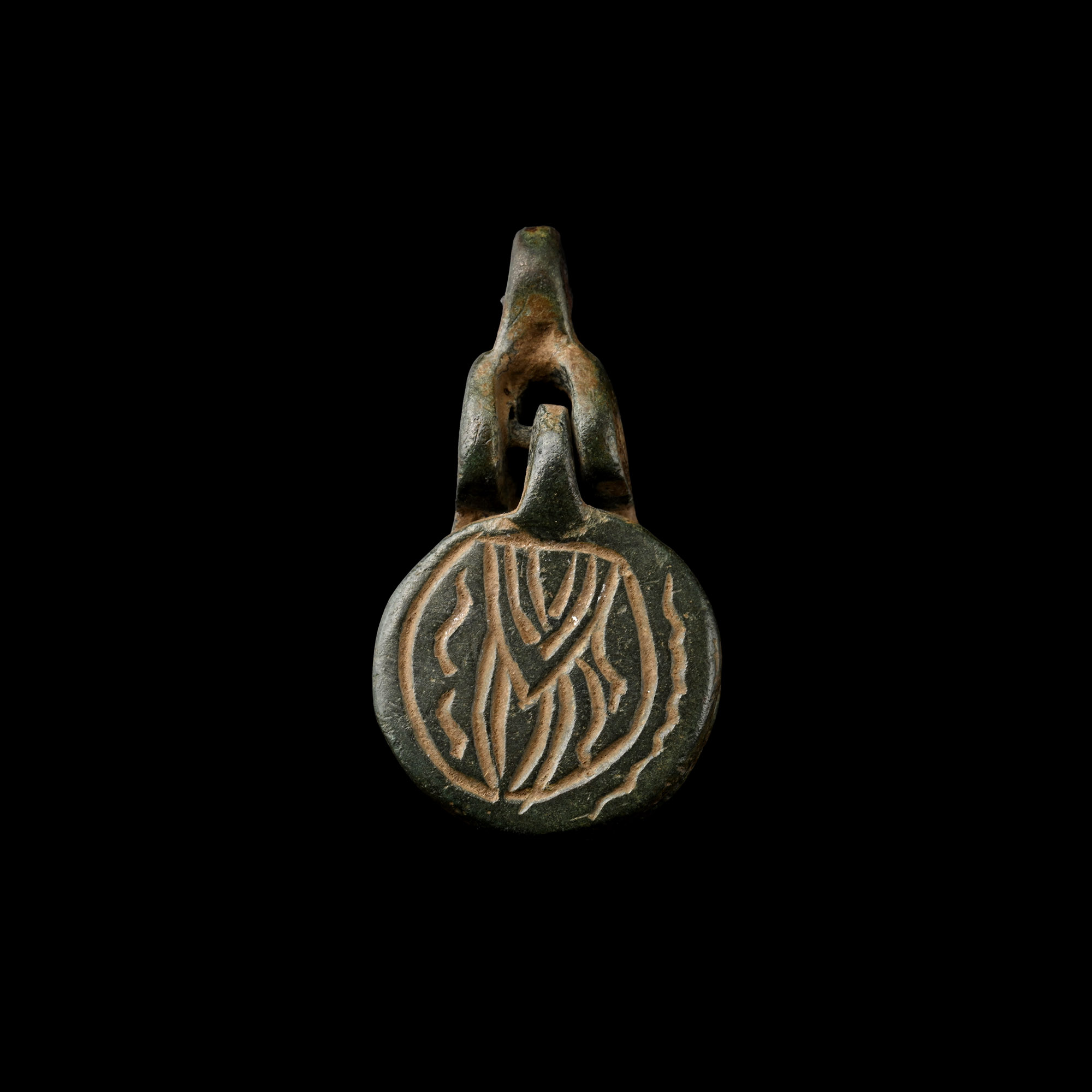 Byzantine Bronze Clapper Pendant with Christ and Inscription