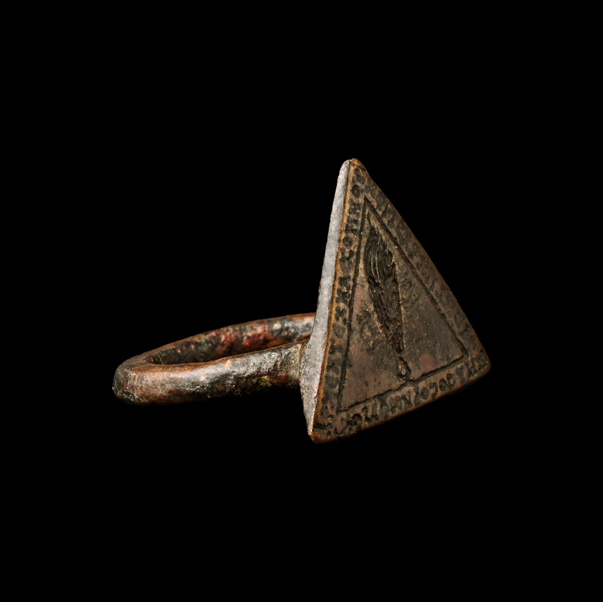 Large Byzantine Bronze Ring with Triangular Bezel with Flaming Torch and Incription