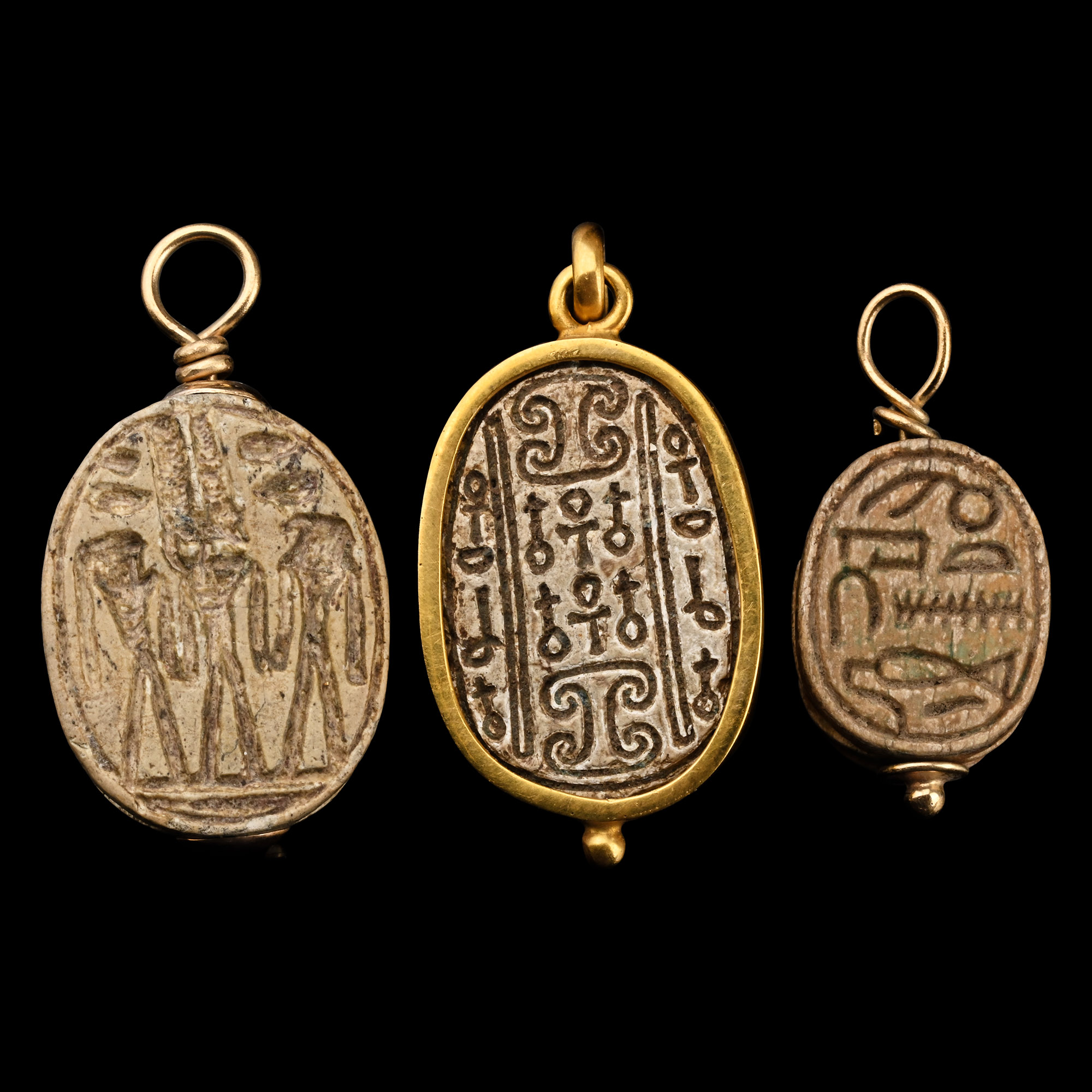 Collection of Egyptian Faience and Steatite Scarabs with Gold Mounts