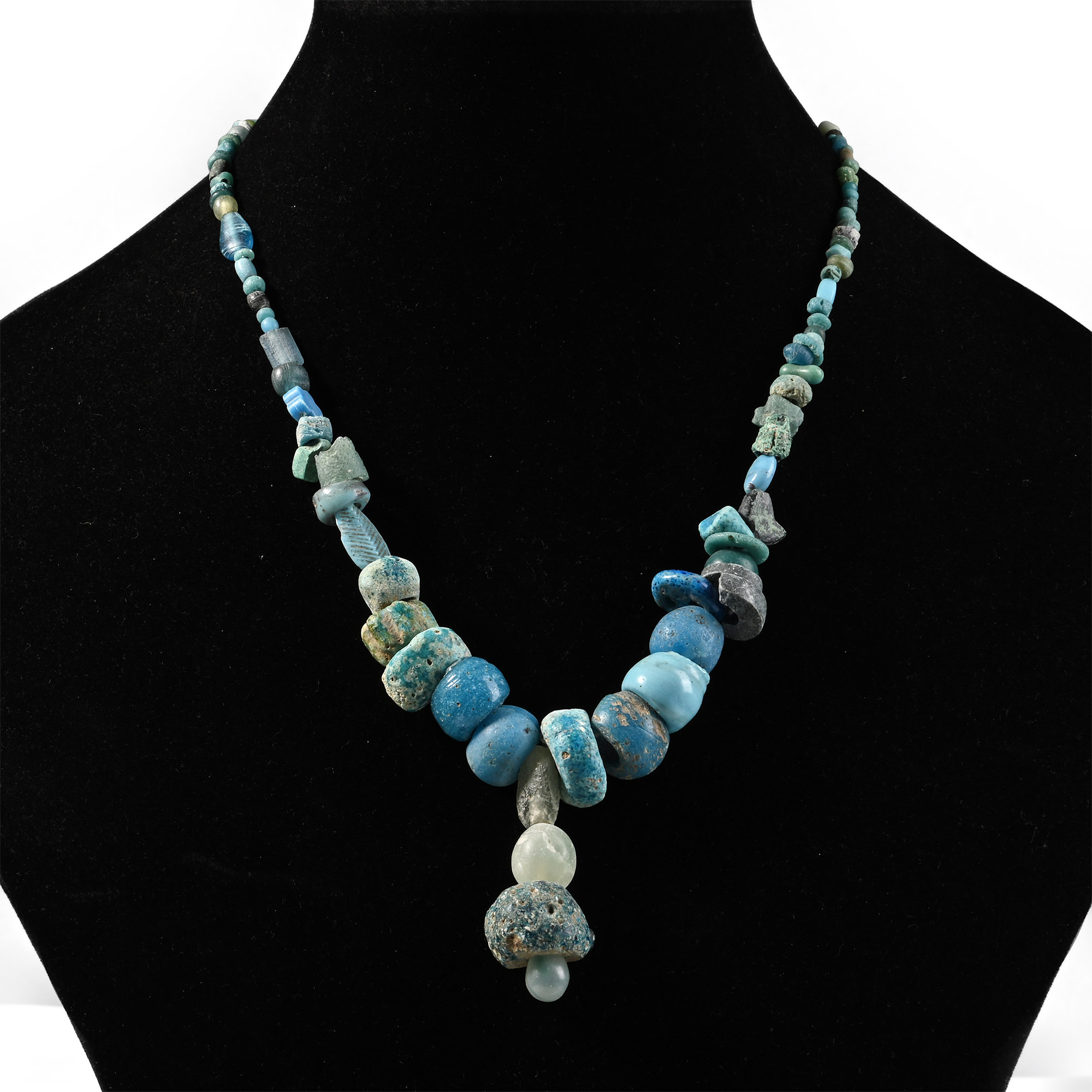 Western Asiatic and Other Pale Blue Stone and Glass Bead Necklace String