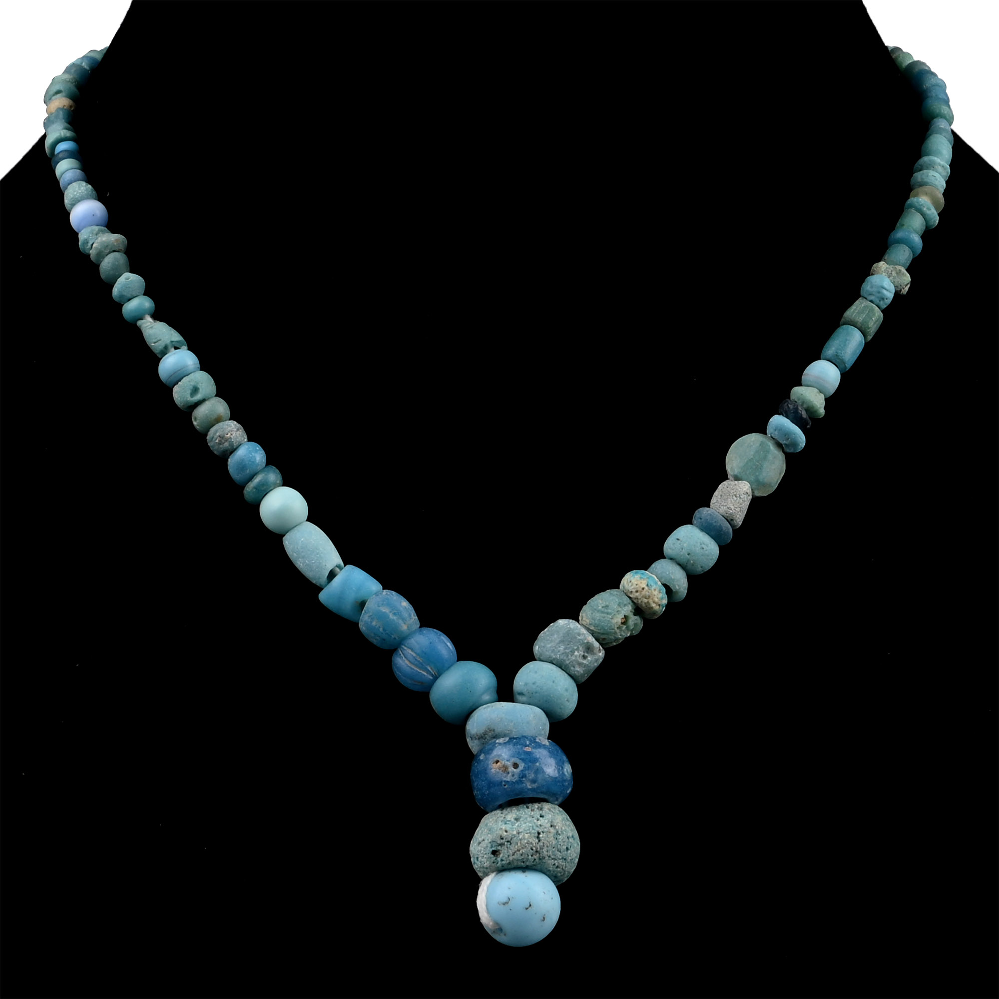 Western Asiatic and Other Pale Blue Stone and Glass Bead Necklace String