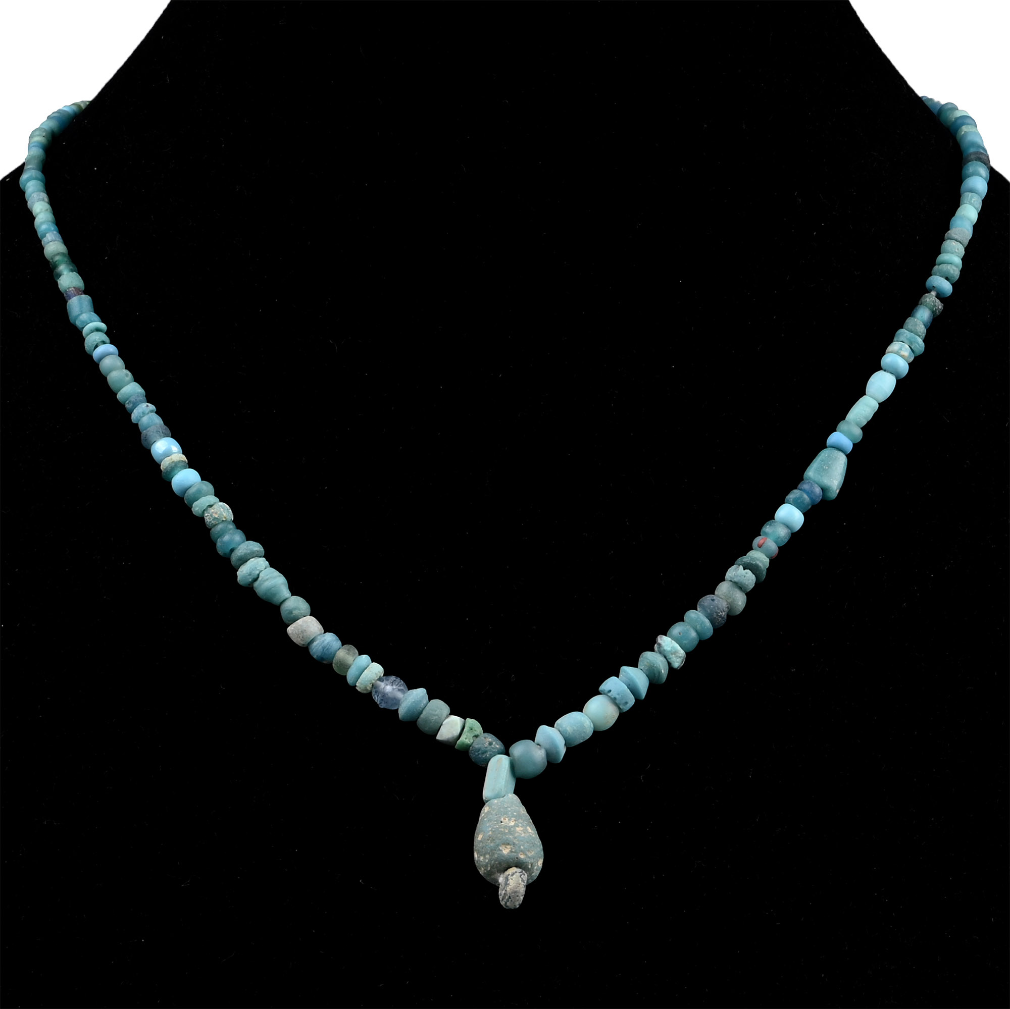 Western Asiatic and Other Pale Blue Stone and Glass Bead Necklace String