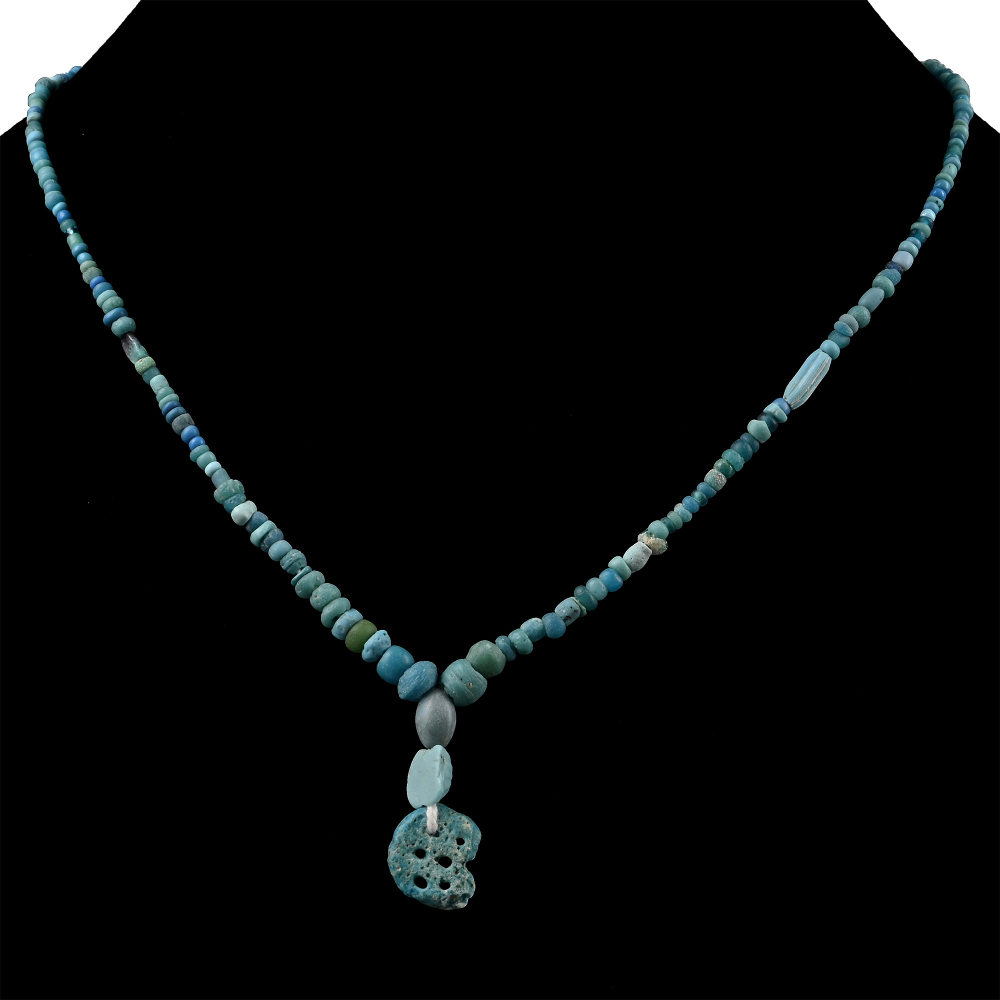 Western Asiatic and Other Pale Blue Stone and Glass Bead Necklace String