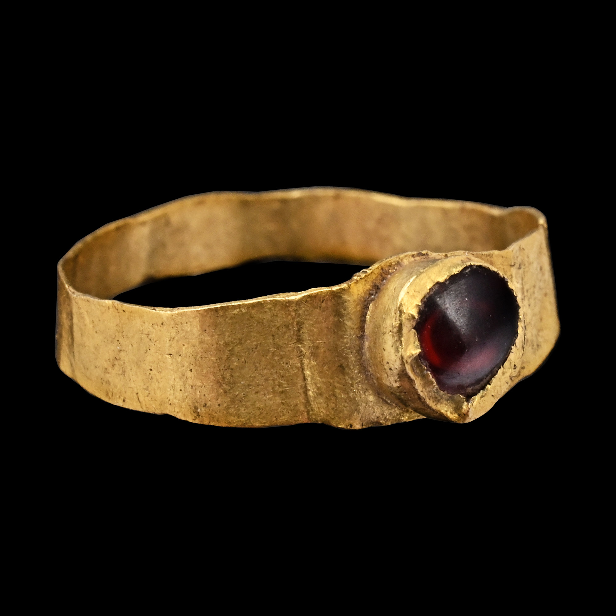 Roman Gold Child's Ring with Ruby-Coloured Gem