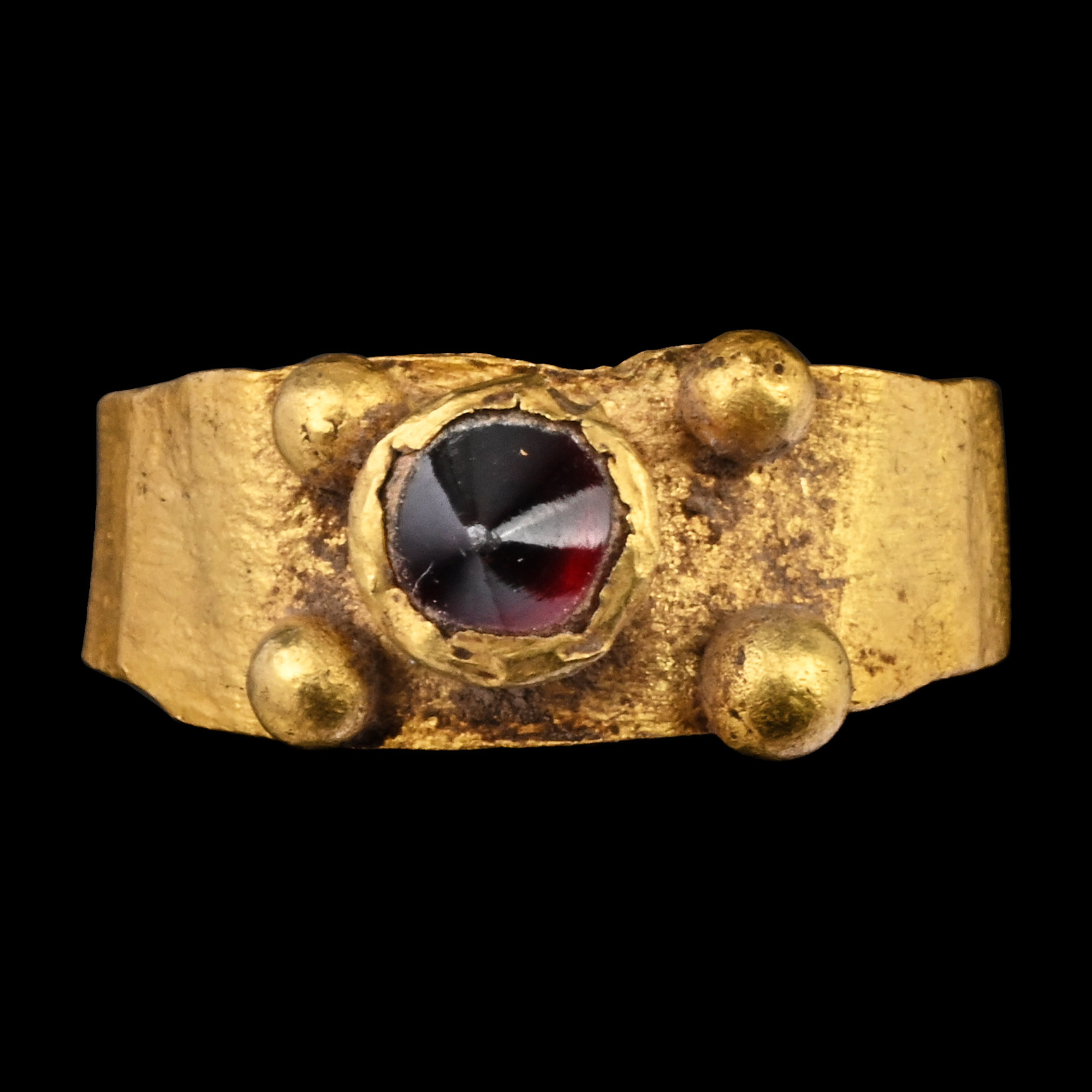 Roman Gold Ring with Conical Ruby-Coloured Gem