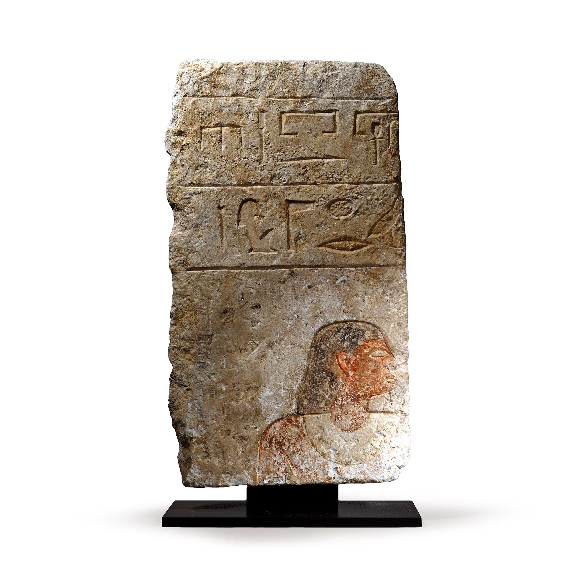 Egyptian Limestone Relief with Painted Head and Hieroglyphics