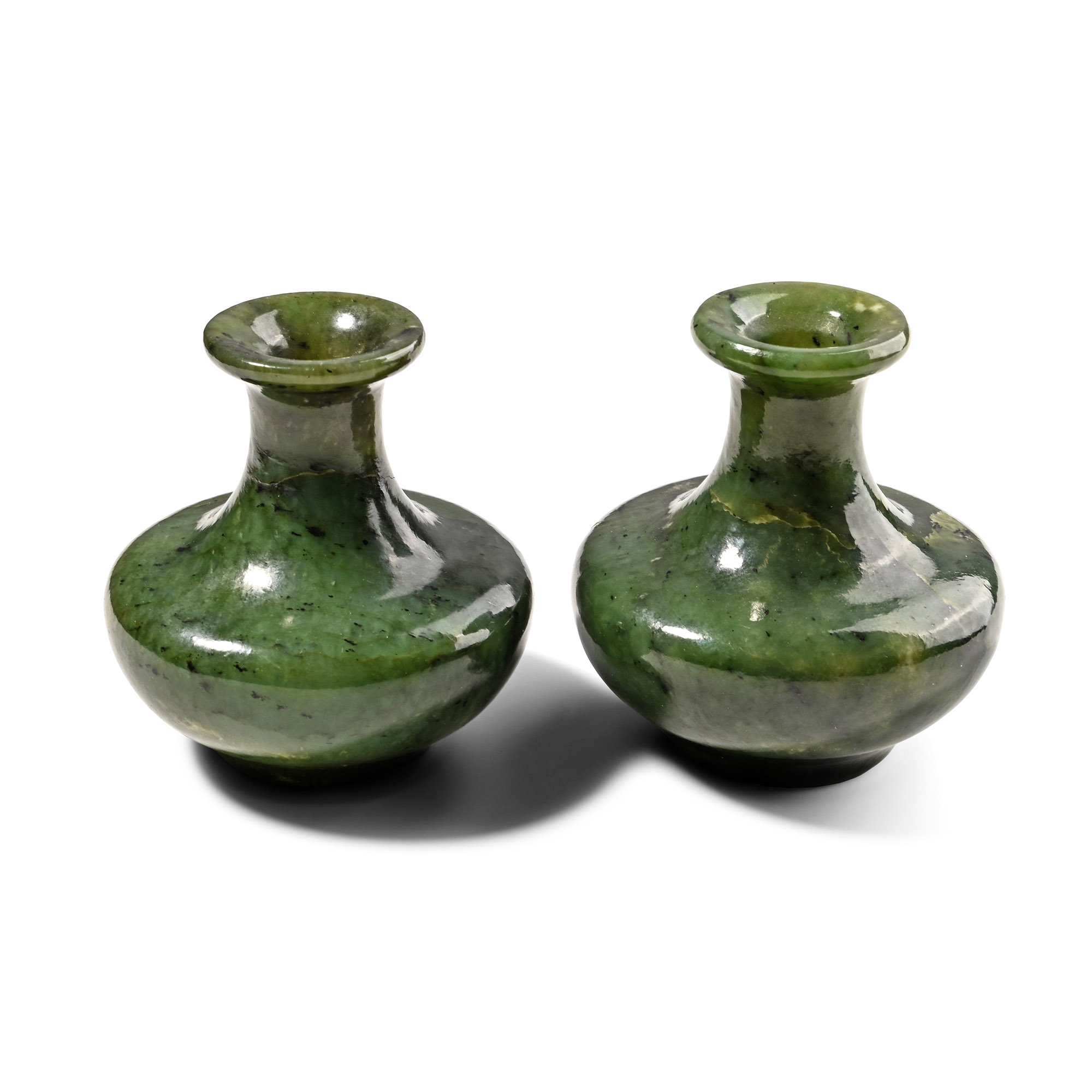 Carved and Polished Green Stone Vase Pair