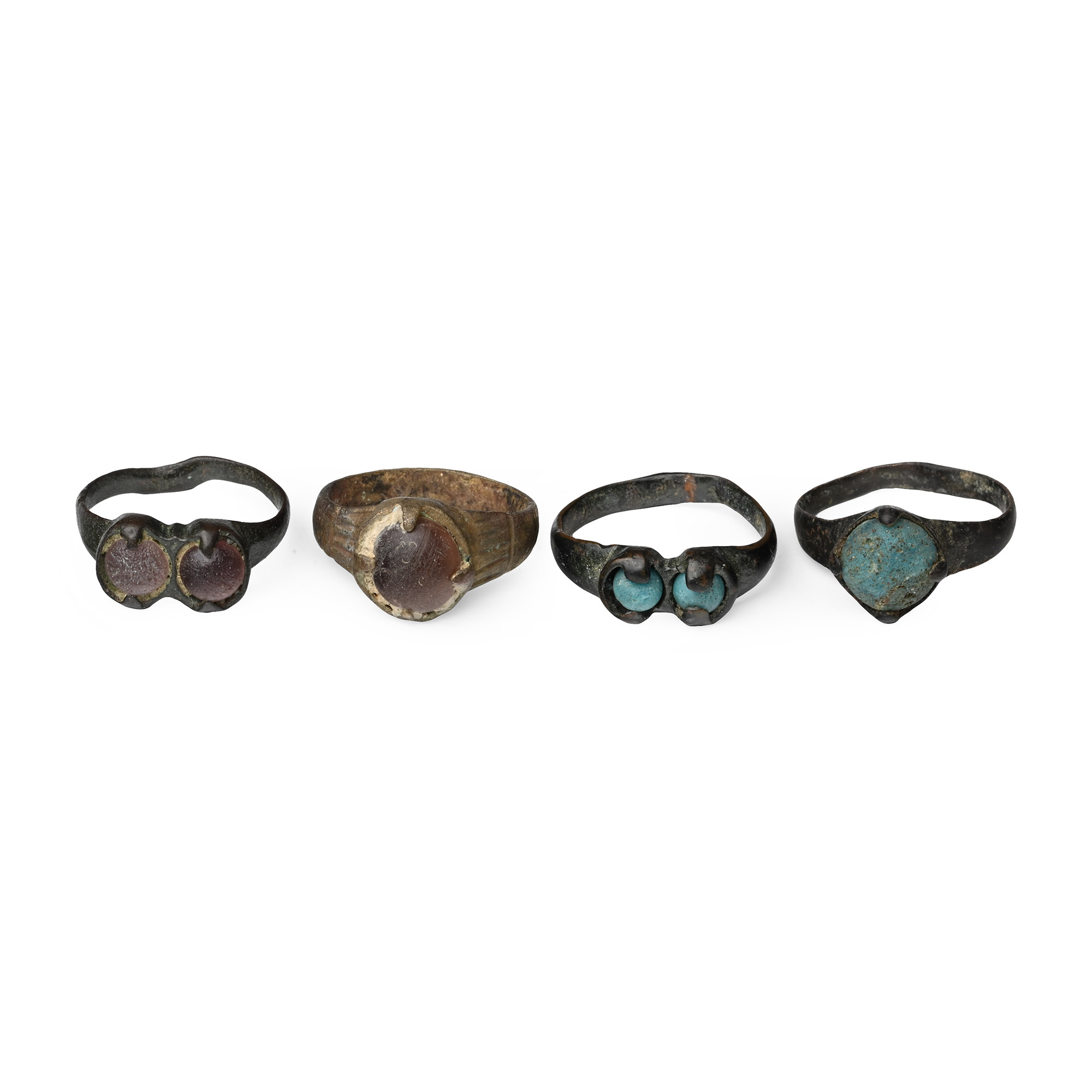 Migration Period Bronze Ring Group with Glass Cabochons