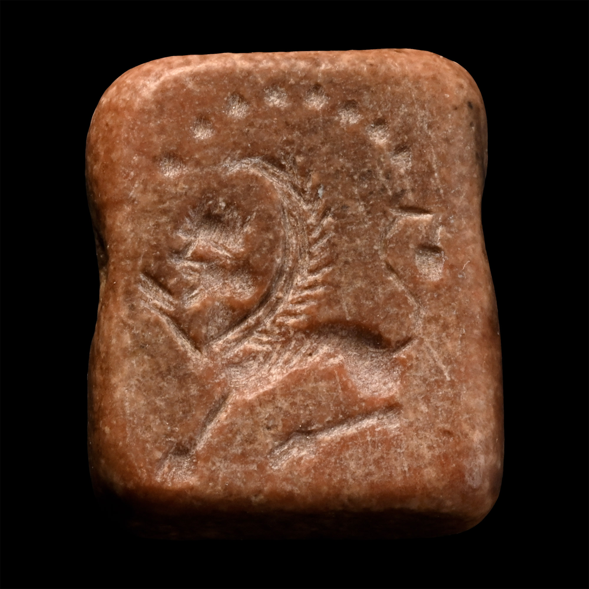 Western Asiatic Bifacial Jasper Amuletic Bead with Human-Head Winged Lion